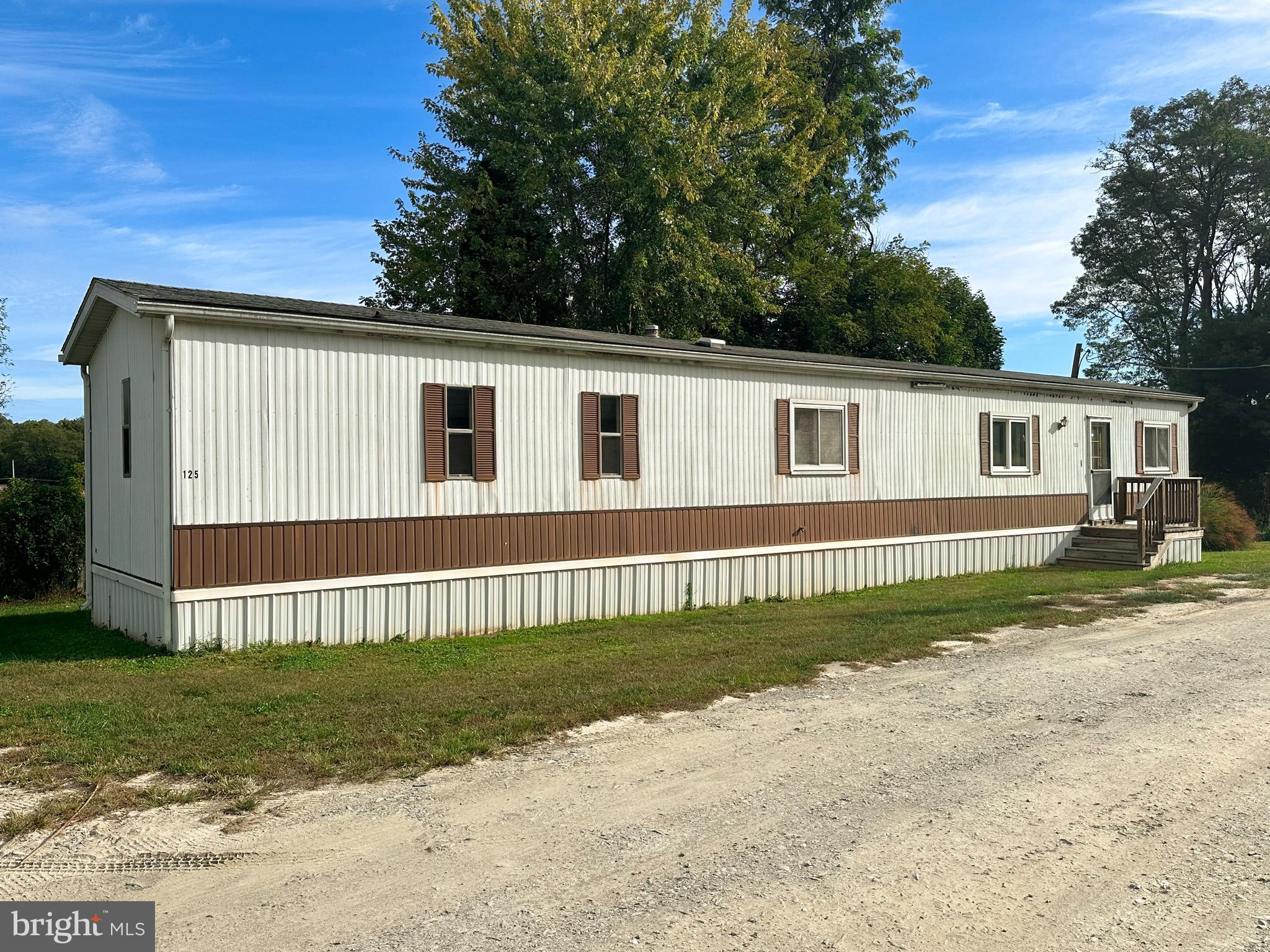 Welcome to 125 Haven Drive in York, PA! One of the standout features of this charming 2-bedroom, 2-full-bath home is its location on a generously sized lot, offering plenty of outdoor space to relax, entertain, or simply enjoy the peaceful surroundings. With new flooring throughout, this home is ready for its new owners to move right in and make it their own. Inside, you'll find an inviting layout with comfortable living spaces designed for everyday living. The spacious primary bedroom features a large walk-in closet, while the second bedroom offers flexibility for guests, a home office, or hobbies. The full bathroom is thoughtfully designed for both comfort and convenience. Enjoy affordable, low-maintenance living with lot rent that includes water, sewer, and trash services. Conveniently located near shopping, dining, and major commuter routes, this home offers the perfect combination of comfort and value. Don't miss your opportunity to make 125 Haven Drive your new home—schedule your private showing today! *All buyers must be approved by the community through the community's application process.*