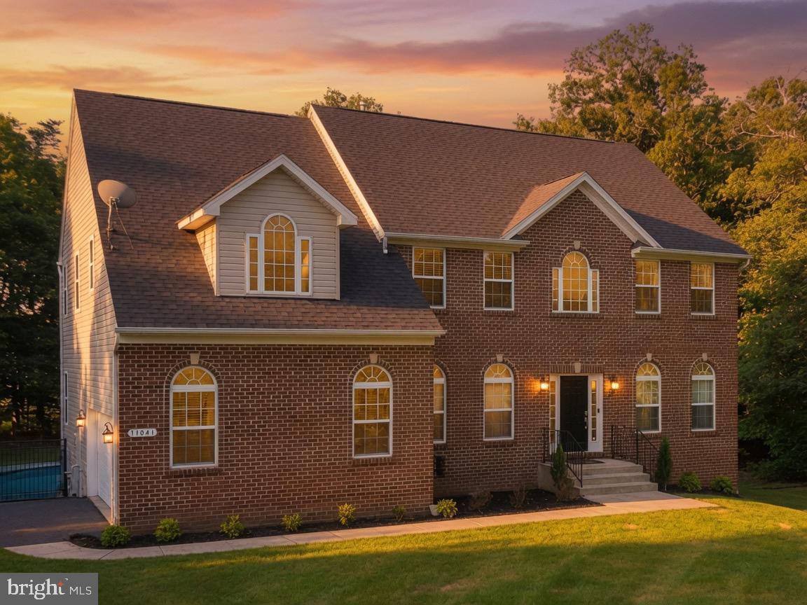Welcome to this impressive brick-front colonial situated on a spacious lot in Brandywine, offering over three levels of comfortable living space designed for both everyday living and entertaining.

Step inside to find a grand two-story foyer, hardwood flooring, and generously sized formal living and dining areas filled with natural light. The open-concept kitchen features abundant cabinetry, ample counter space, a center island, and a seamless flow into the adjacent gathering areas, making it ideal for hosting family and friends.

The main level also includes a dedicated home office, providing flexibility for remote work, study space, or additional living needs.

Upstairs, the expansive primary suite serves as a private retreat with a sitting area, oversized walk-in closets, and a spacious en-suite bathroom complete with dual vanities, a soaking tub, and a separate shower. Additional bedrooms offer generous room sizes and versatile use options.

The lower level provides additional finished living space with endless possibilities for a recreation room, media room, fitness area, or guest accommodations.

Outside, enjoy the privacy and tranquility of a large homesite while still being conveniently located near shopping, dining, parks, and commuter routes. Easy access to Route 5, Route 301, Joint Base Andrews, National Harbor, and Washington, DC makes commuting a breeze.

A wonderful opportunity to enjoy space, functionality, and convenience in a desirable Brandywine location.