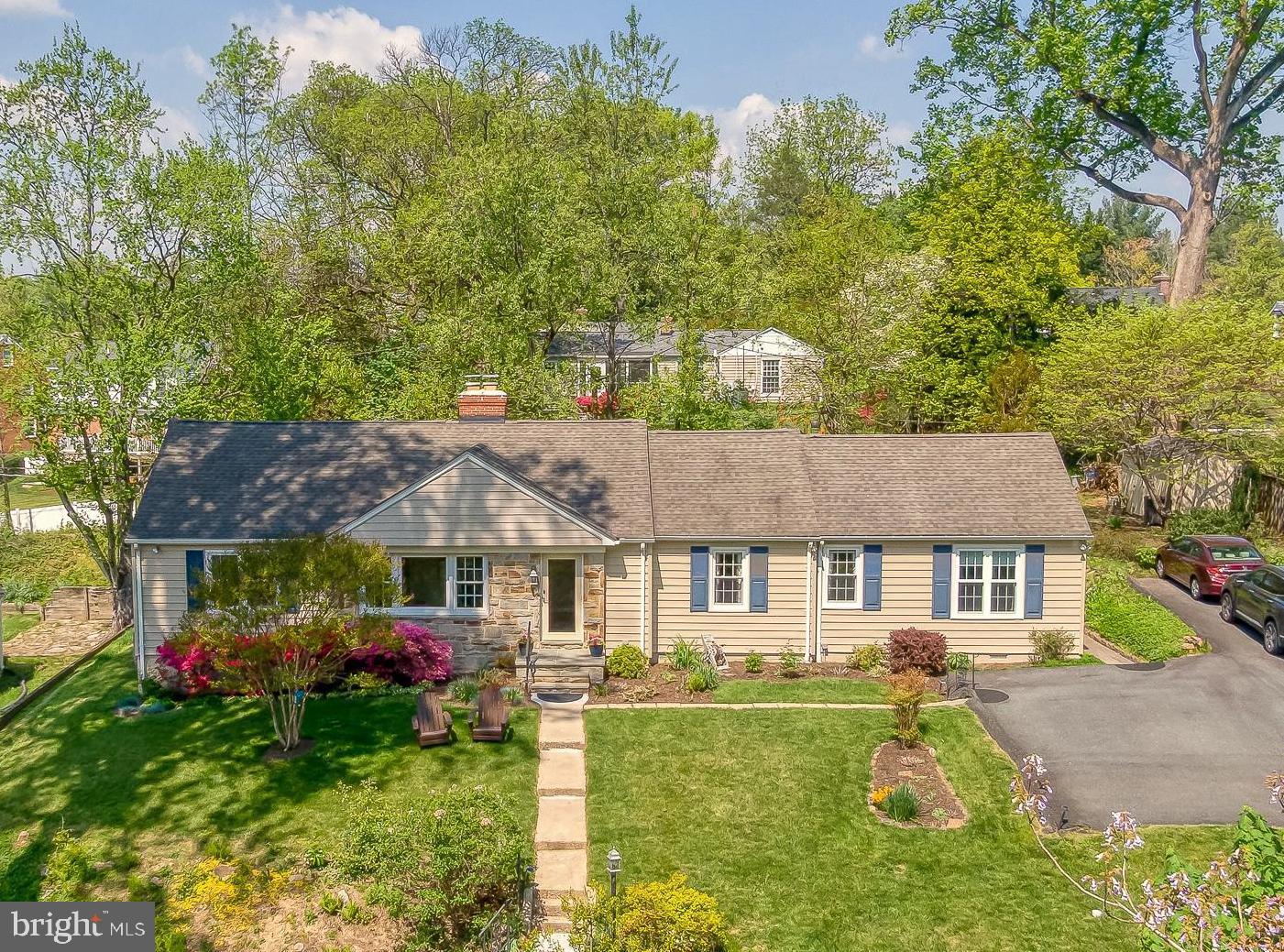 Gorgeous West Towson 4 bedroom updated rancher perched on an elevated private lot with panoramic views and set well back from the road providing ultimate tranquility.  Beautiful landscaping enhances this 
peaceful retreat.  The house has been tastefully updated throughout, including a primary suite and provides the best in a one level lifestyle. This terrific home offers a flexible floorplan for the new owners personal preferences. The primary suite is perfect for those looking for a true four bedroom home but the primary has also been used as a comfortable family room in the past. The kitchen has been updated with granite countertops, soft close cabinetry, hardwood floors and tile backsplash. The stunning living/family room is complete with hardwood floors, a wood burning fire place, crown moldings and a bay window providing beautiful views and abundant natural light. The classic big dining room is complimented with hardwood floors, crown moldings and built-in corner cabinets. Three nice sized bedrooms with hard wood floors and an updated hallway full bathroom complete the main level. The lower level is ready for the new buyers personal touches. Large floored attic also provides a ton of storage are. 
A very special property in West Towson!