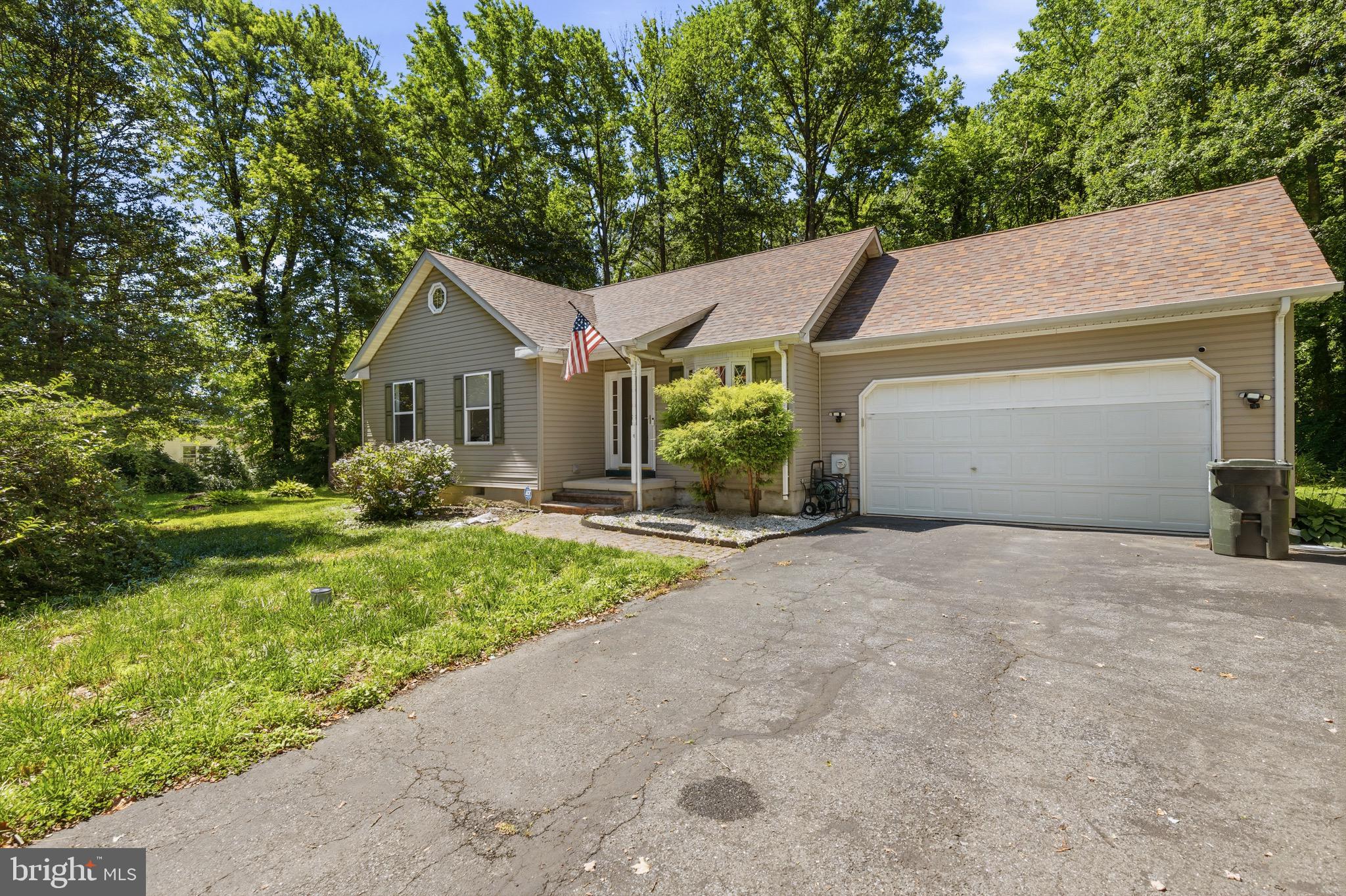 Welcome to 37 Clearview Avenue, where comfort, convenience, and a desirable water oriented lifestyle come together. Nestled in a sought after waterfront community, this charming home offers the perfect blend of everyday functionality and outdoor enjoyment. Step inside to find a bright and inviting interior featuring a spacious living space that flows nicely into the eat in kitchen with stainless steel appliances and ample counter space. Outside, you'll love the refreshed deck, ideal for relaxing, entertaining, or enjoying peaceful mornings with your coffee, overlooking the large private yard.  A spacious attached garage provides plenty of room for parking, storage, or a workshop, while the detached shed offers additional space for lawn equipment, tools, or outdoor gear. Whether you're looking to enjoy nearby water access, spend time outdoors, or simply settle into a welcoming community, this home offers an exceptional opportunity. Conveniently located near local shops, restaurants, marinas, and commuter routes.
