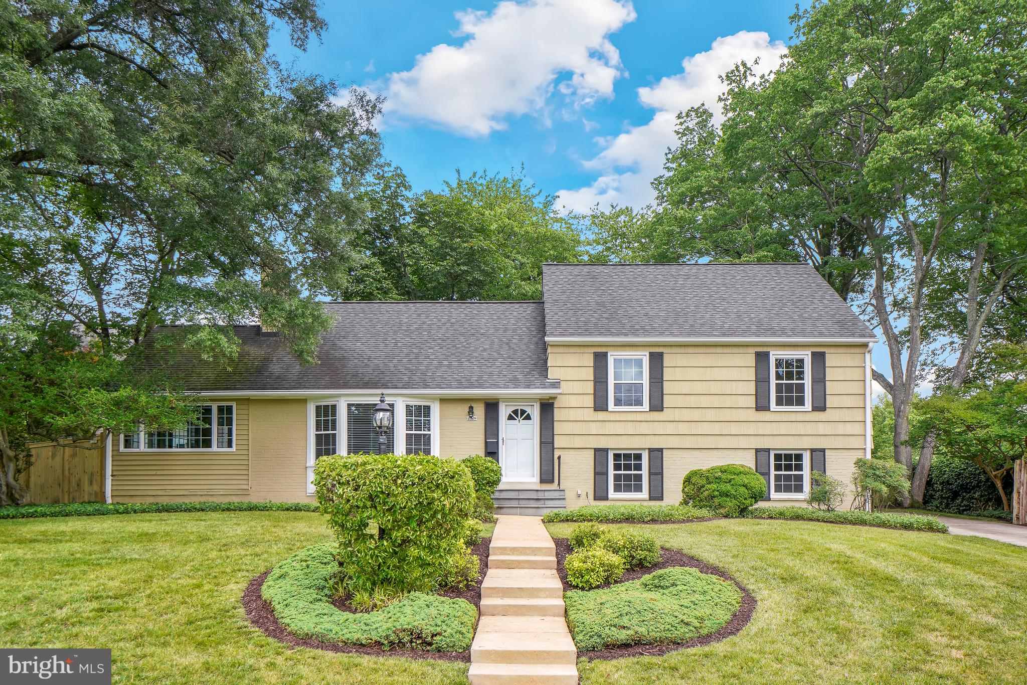 ***** JUST LISTED! ***** WELCOME HOME TO 8524 DOTER DRIVE IN "WAYNEWOOD". Per Washingtonian Magazine, the "Leave-It-To-Beaver Neighborhood", -- "suburbia as it was meant to be!"  Prime Fort Hunt/22308 and Waynewood location just 1 block off George Washington Memorial Parkway, bike path, & EXPRESS BUS to downtown DC.

This home sits at one of the highest points in Waynewood. Beautiful, LARGE 5-LEVELS, 5-BEDROOMS/3-FULL BATHS split level w/striking curb appeal situated on OVERSIZED PREMIUM LOT of nearly 1/3 OF AN ACRE.  Receives premium morning, afternoon, and early evening sun exposure!

MOVE-IN-READY/MAJOR UPDATES AND IMPROVEMENTS: Featuring COMPLETELY RENOVATED KITCHEN AND BATHS, upgraded energy-efficient windows, electrical, HVAC system, beautiful hardwood floors, 6-panel doors, "open-kitchen concept", family room, sun/Florida room/screened-in porch, gas fireplace, extensive hardscape/outdoor patio areas, outdoor shed, IN-GROUND SPRINKLER SYSTEM, "LeafGuard" seamless gutter system, tastefully painted, custom window blinds, and more!

ENTRY FOYER: First, notice you enter into the privacy of a separate "CENTER HALLWAY", -- NOT directly into the living room. Beautiful hardwood floors greet you, as you will find throughout most of the home. The generous size of the CENTER HALL double-coat closet, has more than ample coat space.

LIVING ROOM: Features GAS FIREPLACE and signature BAY WINDOW and French doors. (Fireplace can easily be converted back to woodburning.) Beautiful hardwood floors here too.

SUN/FLORIDA ROOM/SCREENED-IN PORCH:  Additional "YEAR-ROUND LIVING SPACE" w/three-sides of windows. Also serves as a SCREENED-IN-PORCH. Convenient access to outdoor patio and beautiful back yard!

OPEN-KITCHEN CONCEPT: Completely renovated! Featuring upgraded Craftsman/Shaker style cabinetry, countertops/backsplash, and stainless-steel appliances. Open to dining room and complete with BREAKFAST BAR! Plus, large picture window overlooking private, fenced, treed rear yard.

DINING ROOM: Seamlessly connects living room, kitchen, and sun/Florida Room making for ideal circular traffic flow.

FAMILY ROOM: More additional living space. Convenient to adjoining guest/full bath #3 and 5th bedroom.

PRIMARY/MASTER BEDROOM w/FULL BATH: Hardwood floors in this bedroom and all upper-level bedrooms. Plenty of room for king-size bed and sitting area. Features completely renovated full bath w/tiled floors and walk-in shower.

BEDROOMS #2 AND 3: On same level as primary/MBR. Like much of the rest of the home, also with beautiful hardwood floors!

BEDROOM #4: Largest of all bedrooms. Ideal for guest bedroom, playroom, or artist's studio. Convenient to WALK-UP ATTIC.

FULL BATH #2: Completely renovated! Features tiled floors and bathtub/shower combo. Serves bedrooms #2, #3, #4.

BEDROOM #5: Complete w/its own full bath.

GUEST/FULL BATH #3: Completely renovated! Conveniently located off of family room and bedroom #5 featuring walk-in shower.

BONUS "WALK-UP ATTIC": Ideal as it is w/LOTS OF STORAGE or can easily be finished off into additional living space!

UTILITIES//LAUNDRY ROOM: Upgraded HVAC system. Including energy-efficient 2-zones system, tankless gas hot water heater, upgraded energy-efficient windows and doors, electrical, including outlets, light fixtures, and upgraded 200 AMP main electrical panel.

YARD, PATIO, OUTDOOR SHED: Premium treed lot of NEARLY 1/3 ACRE. Beautifully and tastefully landscaped yard w/IN-GROUND SPRINKLER SYSTEM!  Extensive patio/hardscape areas. PLUS, outdoor covered shed area. Driveway is at least 3-cars deep.

LOCATION: One of the best Waynewood and 22308 locations! Easy commute to DC, Alexandria, Pentagon, and Arlington, and walk to the bike path, Waynewood Elementary. Carl Sandburg Intermediate, Fort Hunt Park, and Express Bus to downtown DC!

DISCLOSURE & DISCLAIMER: Listing Agent related to owner. All information deemed reliable but not guaranteed with room dimensions approximate.
