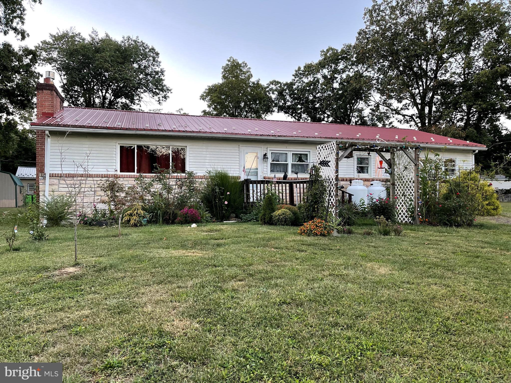 NEW PRICE!! Take a look!!

Convenient Locations just outside of town. Walk-in shower in one bedroom, Spacious family room; Beautiful wood burning fireplace. Full basement, utility shed, great rear backyard with open concrete patio. Pet friendly area.