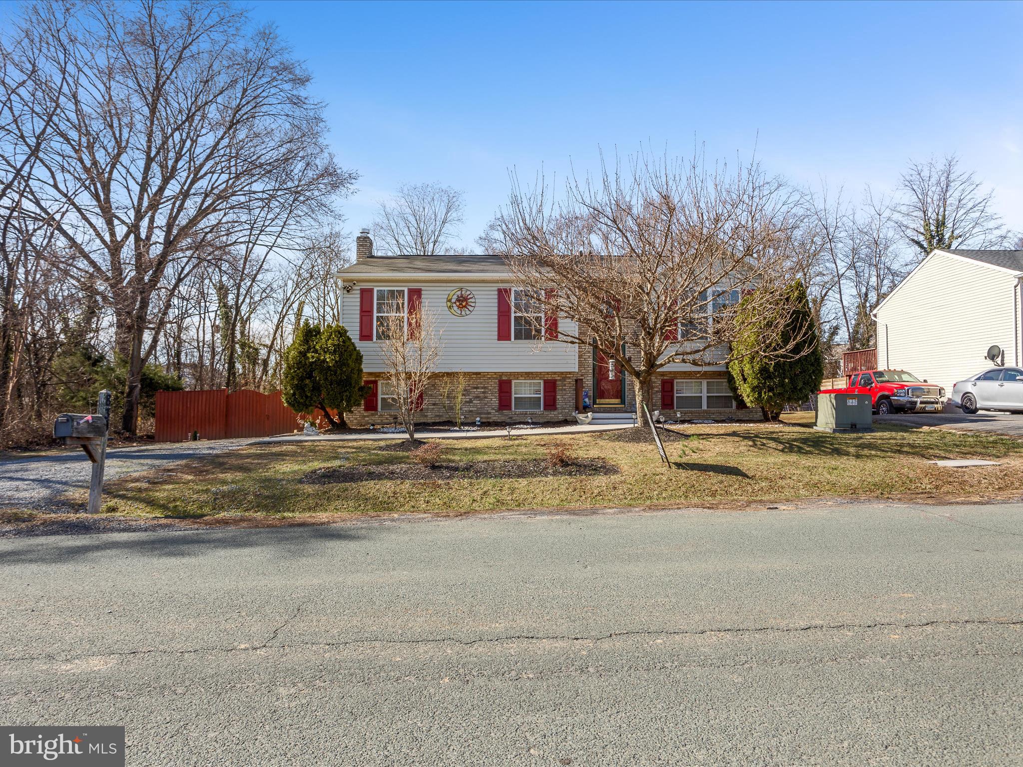 Spacious split level in the heart of Winchester.  Conveniently located off of Berryville Avenue for ease of commuting.  The home has a large open floor plan with easy to maintain LVP flooring in the main living areas. 
 Three bedrooms and two updated bathrooms on the upper level.  The fourth bedroom is located on the lower level and has proper egress.  Both levels have a large gathering area for entertaining.  Second full kitchen in the lower level.  Gas stove to heat the home efficiently.  Fully fenced rear yard for your privacy with a shed for extra storage.