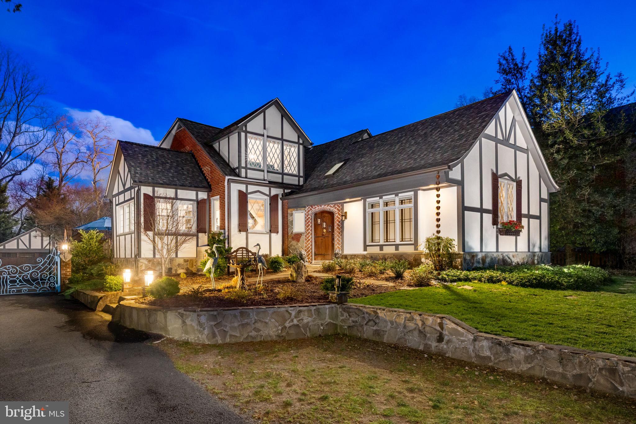 Welcome to this sumptuous 3 bedroom, 3.5 bathroom home on a lush lot in Vienna. Following a major renovation in 2022 and designed after the storybook cottages in Carmel by the Sea, the home won Honorable Mention from the Mid-Atlantic Association of Home Builders. The changes were made in keeping with the home's old world charm with a nod to modern artistry and convenience. The main floor features a living room with decorative fireplace, formal dining room, and kitchen with black brass cage foyer pendant chandelier. There are two bedrooms on this level and two full bathrooms. Upstairs is the primary suite with a sitting room with fireplace, full bathroom, and custom closet plus a cedar closet and laundry. The finished basement has additional laundry, ample storage and a half bath. Outside, formal landscaping abounds with both Japanese and English gardens, and a Trex deck, including outdoor furniture and stuaries which convey.
<br>
<br>
Exterior improvements include the addition of new triple dormer windows to the front of the primary second floor bedroom area, which required demolishing and capping the chimney. A new gable roof was added to the butler's pantry, and new roofing and gutters were installed on both the house and detached garage. The brick was parged to match the stucco on the front of the house, and stone veneer was added around the foundation and garage front. All exterior wood trim was replaced with PVC, and the butler's pantry windows and door were replaced. The entire house and garage were painted, and stone columns with finials and an antique gate were installed at the front of the property. Other exterior enhancements include an enlarged first floor primary suite window, a new skylight in the upstairs primary bathroom, new Trex decking on the second floor balcony, deer fencing in the rear, a new Trex deck alongside the garage, a new garage door and opener, professional exterior lighting in the backyard, and the installation of Japanese and English gardens.
<br>
<br>
Interior renovations were equally comprehensive. The second floor primary bathroom and walk-in closet were completely gutted and luxuriously renovated, with the closet featuring a Container Store system and LG stacked washer/dryer. The kitchen was overhauled with quartz countertops, new appliances, and shiplap ceilings in both the kitchen and sunroom. A butler's pantry was created with built-in cabinets and a wine refrigerator. Hardwood floors on the main and second levels were stripped and re-stained white, and extensive molding was added throughout. The entire interior was repainted, and LVP flooring was installed in the basement. A new Trane HVAC system with a steam humidifier was installed, along with a Mitsubishi mini split for the second floor primary suite. The first floor primary bathroom received a new vanity and fixtures, and lighting was updated throughout. Additional improvements include a redesigned living room fireplace, whole house water filtration systems, and a radon removal system.