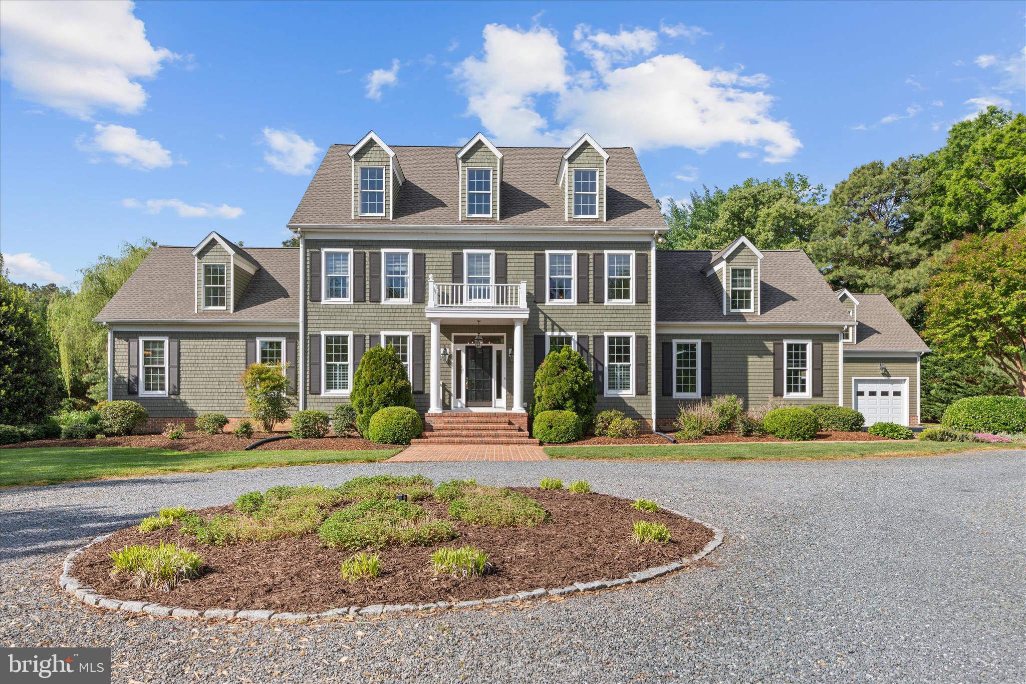 Set on 2.14 beautifully maintained acres, this exceptional 6-bedroom home offers the perfect blend of space, comfort, and outdoor living. A thoughtfully designed layout features a desirable first-floor master suite, providing privacy and convenience with generous proportions and serene views of the surrounding landscape.

The home’s expansive interior includes multiple living and entertaining areas, ideal for both everyday living and hosting guests. Large windows throughout invite natural light and showcase the property’s stunning grounds.

Step outside to your own private retreat, complete with a sparkling pool and extensive landscaping that creates a peaceful, park-like setting. Whether relaxing poolside or enjoying the open green space, this property offers endless opportunities for outdoor enjoyment.

A detached two-car garage adds functionality and additional storage, complementing the home’s impressive features. With six spacious bedrooms and ample acreage, this property provides flexibility for a variety of lifestyles—all in a picturesque and private setting.