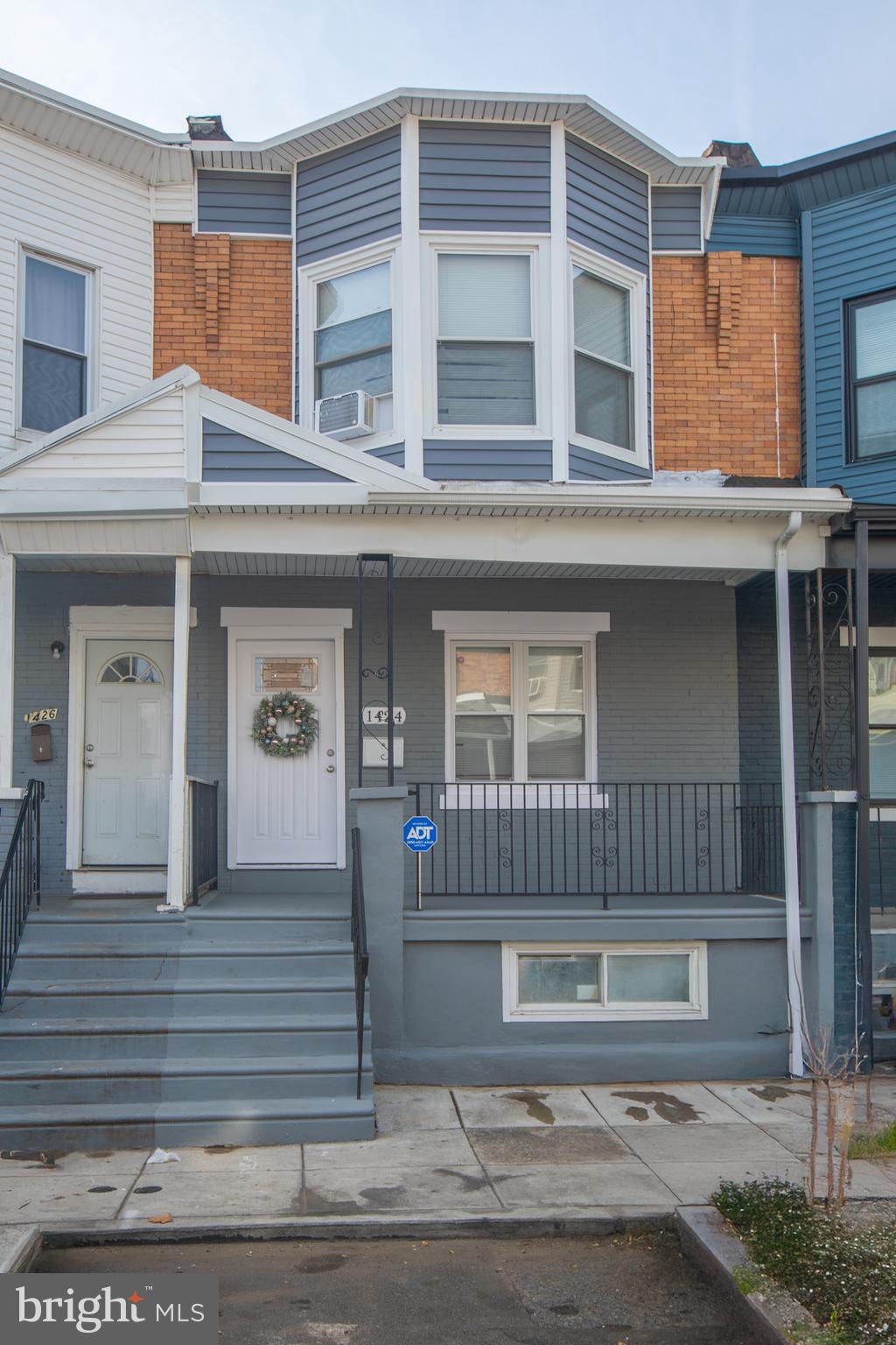 PRICE IMPROVEMENT!!!! Welcome to 1424 S. Vogdes St., a beautifully renovated townhouse in the up and coming Cobbs Creek section of Philadelphia, only a few minutes away from University City. This home features an open floor plan with engineered hardwood floors, 9-ft ceilings, recessed lighting throughout the home, and a custom wrought iron railing along the stairway that adds a stylish, modern touch. The elegant kitchen offers 42" white shaker cabinets, granite countertops, subway tile backsplash, and stainless steel appliances. The spacious dining area, with the elegant dining room set included in the sale, is ideal for hosting holidays and family gatherings. A convenient powder room and laundry hookup complete the first floor, with access to a fenced backyard perfect for outdoor cookouts and enjoyment. The second floor offers a large primary bedroom with bay windows adding ample natural light, a half bathroom and a generous closet. There are two additional well-sized bedrooms and a stylish hall bath. New carpeting finishes the upper level. The clean, dry basement features new cement flooring and offers great potential for finishing. Additional upgrades include new HVAC, electrical, plumbing, windows, drywall, and more. Located near schools, SEPTA, shopping centers, and minutes from Cobbs Creek Park, University of Penn, Drexel University, St. Joseph's and Community College of Phila, offering both comfort and convenience. Don’t miss an opportunity today that you might regret in the future and schedule your showing today.