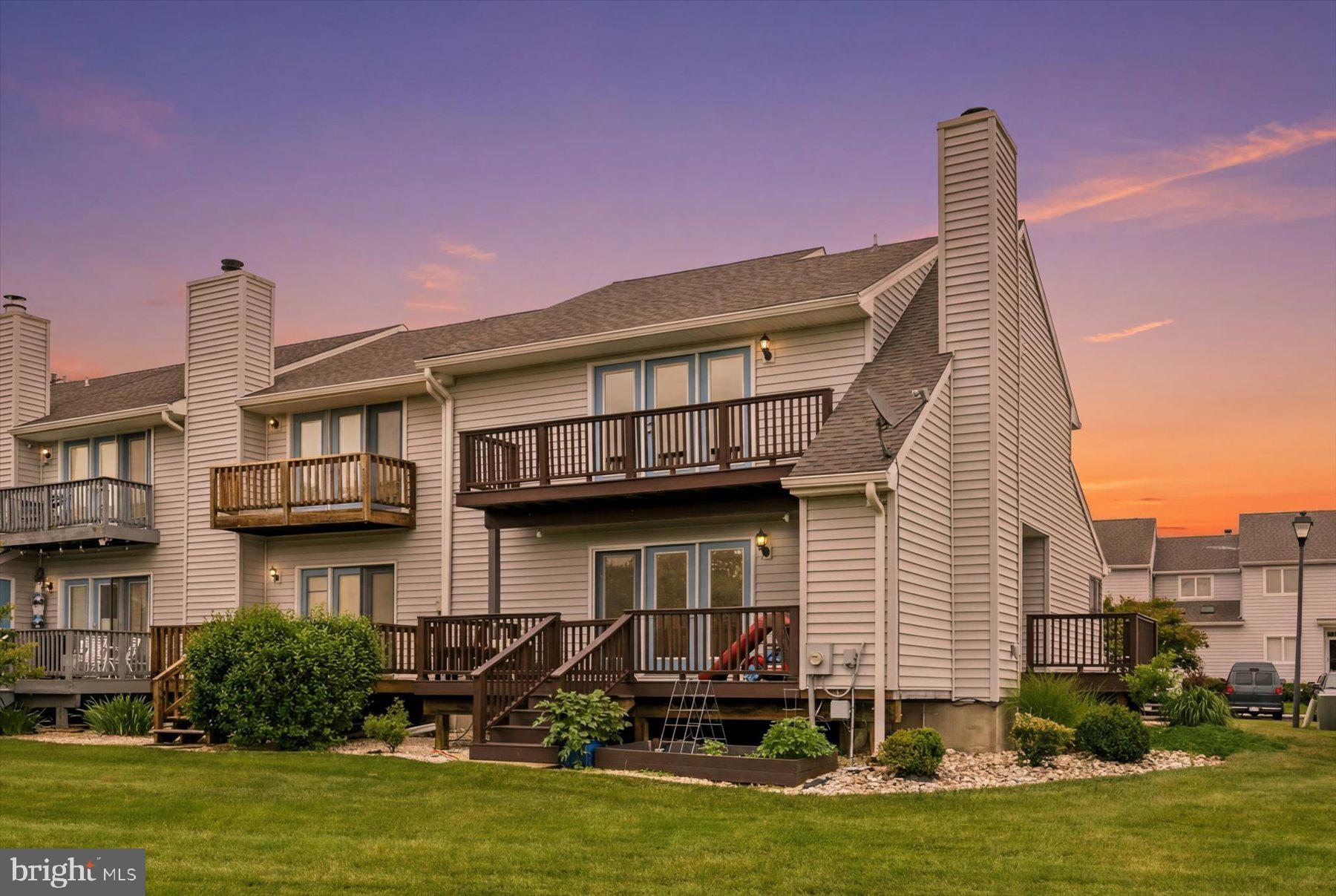 Experience Eastern Shore living at its finest in this oversized end‑unit townhome offering beautiful water views, multiple composite decks, and a community that has recently upgraded its siding, roofing, and more. Inside, the main level features hardwood floors, recessed lighting, a fireplace, an updated full bath, and a main‑level bedroom, along with a spacious kitchen and dining area and a conveniently located laundry room. A brand‑new heat pump system adds comfort and efficiency. Upstairs, the primary suite boasts a private balcony, large ensuite bath, and generous closet space, while the secondary bedroom includes its own full bath. Just 3 minutes to the Bay Bridge, 20 minutes to Annapolis, and 45 minutes to D.C., this home is ideal for a weekend retreat or full‑time living. Condo amenities include a pool, clubhouse, lawn care, waterside path, snow removal, and trash/recycling. Enjoy kayaking, paddleboarding, boating, or simply taking in the water views, all within walking distance of restaurants, shops, a winery, pet store, post office, and more.