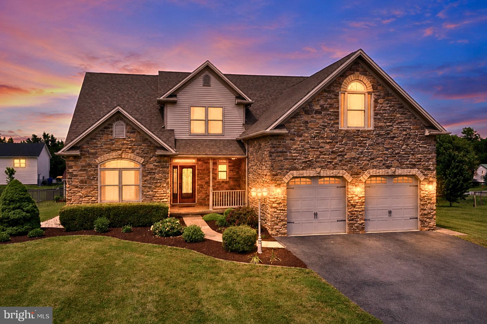 If you’ve been searching for a home that combines space, comfort and move-in-ready condition, this one deserves a closer look! Located in the desirable Orchard Estates subdivision, this 4 bed, 2 full bath, 2 half bath home offers over 3,200 finished square feet of living space on a beautifully maintained lot. From the moment you arrive, it’s clear this property has been well cared for. Recent improvements include a new dishwasher and garbage disposal (2025), professionally restored patio pavers with new sand joints (2026), power-washed stone walkways (2026), refreshed river rock landscaping with new weed barrier and edging (2026), and a professionally serviced HVAC system in spring 2026. Inside, the home offers beautiful hardwood floors throughout the main level and upstairs hallway, and a layout that balances everyday functionality with comfortable living. The kitchen serves as the heart of the home, featuring granite countertops, a center island, corner pantry, and plenty of workspace for cooking, gathering and entertaining. The living room is highlighted by cathedral ceilings and a natural gas stone fireplace, creating a warm and inviting space filled with natural light. One of the standout features is the main-level primary suite, offering tray ceilings, a walk-in closet, and a private bath with a tile shower. The upper level provides additional bedrooms and flexible living space, while the finished basement adds even more room for entertaining, hobbies, a home gym or a media room. A half bath and additional unfinished storage space make the lower level as practical as it is functional. Step outside and enjoy a backyard designed for both relaxation and entertaining. The fully fenced rear yard features a covered Trex deck, paver patio with garden wall, storage shed and beautiful mountain views in the distance that provide a scenic backdrop throughout the year. Additional highlights include natural gas heat, a two-car attached garage, and a covered front porch that adds to the home's charming curb appeal. Conveniently located just minutes from Interstate 81, Route 30, the Chambersburg Country Club, and Greene Township Park, this property offers the perfect balance of accessibility and peaceful neighborhood living. If you’ve been waiting for a home that offers generous living space, thoughtful updates, beautiful outdoor areas and move-in-ready condition, this is one you’ll want to see in person!