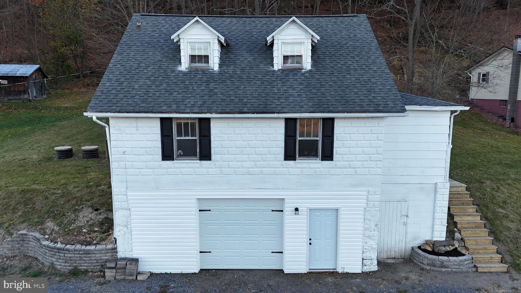 Welcome to 1081 Business 220! This stunning Cape Cod home is just minutes from Bedford Springs, with easy access to 220 and the PA Turnpike. Featuring numerous updates, this must-see property boasts three bedrooms, two fully renovated bathrooms, and a gorgeous new kitchen that opens into a spacious living room and formal dining room. Additional amenities include an oversized one-car garage, off-street parking with potential for expansion, scenic views, oil hot water baseboard heating, and a well and septic system on the premises.