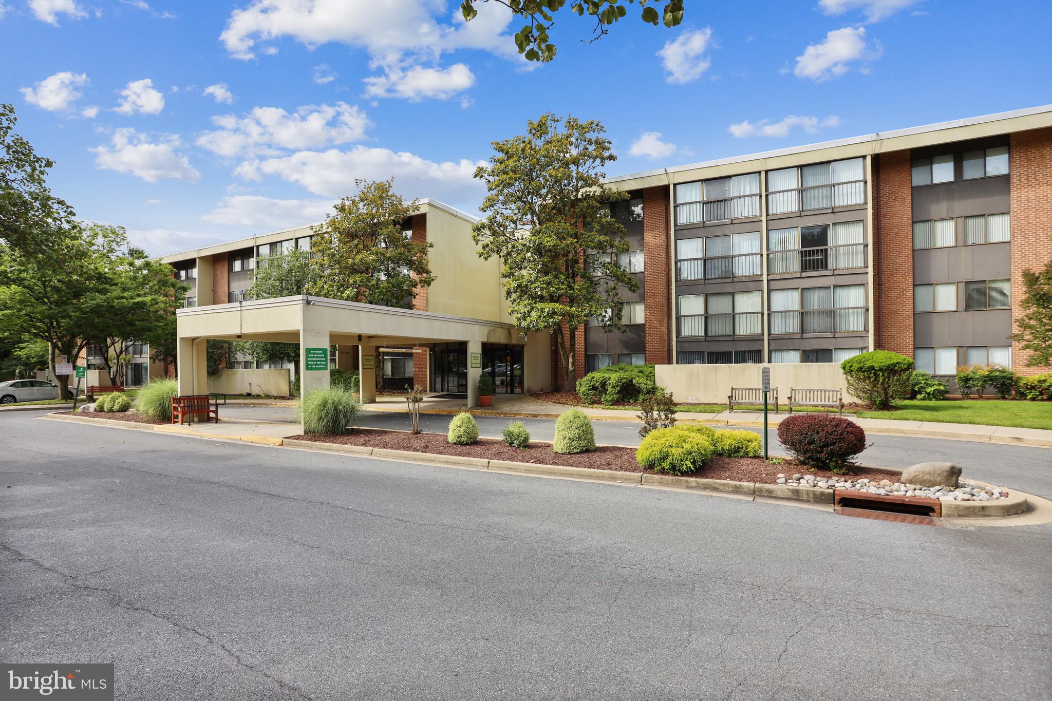 Inviting & well maintained 2-bedroom plus den unit in 55+ community! Bright sun-soaked home offers peaceful tree views and 2 exposures. Lovely remodeled kitchen with tile floor and breakfast bar. Washer & dryer in unit. Move-in ready! Secure handicapped-accessible elevator building with covered entrance for dropping off passengers or groceries. Assigned parking space and storage unit. Ample visitor parking. Condo fee includes cable/Internet. Superb Leisure World amenities include acres of green space, walking trails, two clubhouses, gym, swimming pools, tennis courts, golf course, fitness classes, clubs for all interests, library, medical center, post office, free shuttle bus, 24-hour security, and so much more. On-site dining options are The Cascade Room, Stein Room, and Terrace Room (currently offering delivery). Shopping plaza with more restaurant options and grocery store right outside the gates.