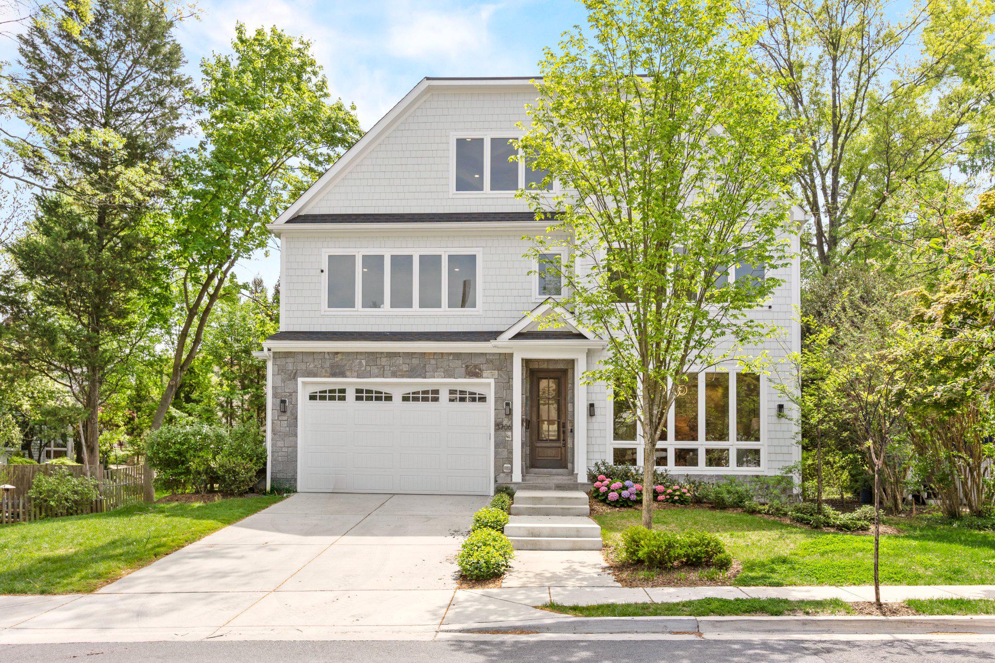 Beautifully crafted with quintessential Chevy Chase elegance, this exceptional 2024-built residence is ideally nestled in the highly coveted Chevy Chase Village Section 3.  Set on an expansive 10,637-square-foot lot, the home offers a rare sense of privacy and serenity—an oasis in the heart of one of the area’s most distinguished and vibrant communities, celebrated for its gazebo park, cherished neighborhood traditions, Saturday Farmer's market, dog park, and effortless access to boutique dining and local shopping.
Spanning four impeccably finished levels, this home showcases a refined architectural vision paired with elevated modern design and bespoke finishes throughout. A private elevator and attached two-car garage enhance everyday conveniences.  The chef’s kitchen serves as the heart of the home—designed for both grand-scale entertaining and intimate gatherings—flowing seamlessly into expansive indoor-outdoor living spaces.

The mature, lushly landscaped rear grounds create a private sanctuary, ideal for al fresco dining, entertaining, and quiet relaxation, surrounded by greenery.

Every detail has been meticulously curated with refined finishes to the thoughtfully designed living spaces; the home exudes understated luxury at every turn. The serene owner’s suite offers a true retreat, complemented by a spa-inspired bath.  All en-suite baths for each secondary bedroom. The fully finished lower level elevates entertaining with a stylish built-in bar and generous recreational space.

Perfectly situated near Rock Creek Park and Meadowbrook Stables, the residence offers an unmatched lifestyle of recreation and natural beauty, all within the Bethesda–Chevy Chase High School cluster, which includes the acclaimed International Baccalaureate (IB) program.

A rare offering of timeless elegance, modern comfort, and enduring sophistication in one of Chevy Chase Village Section 3's most sought-after enclaves.