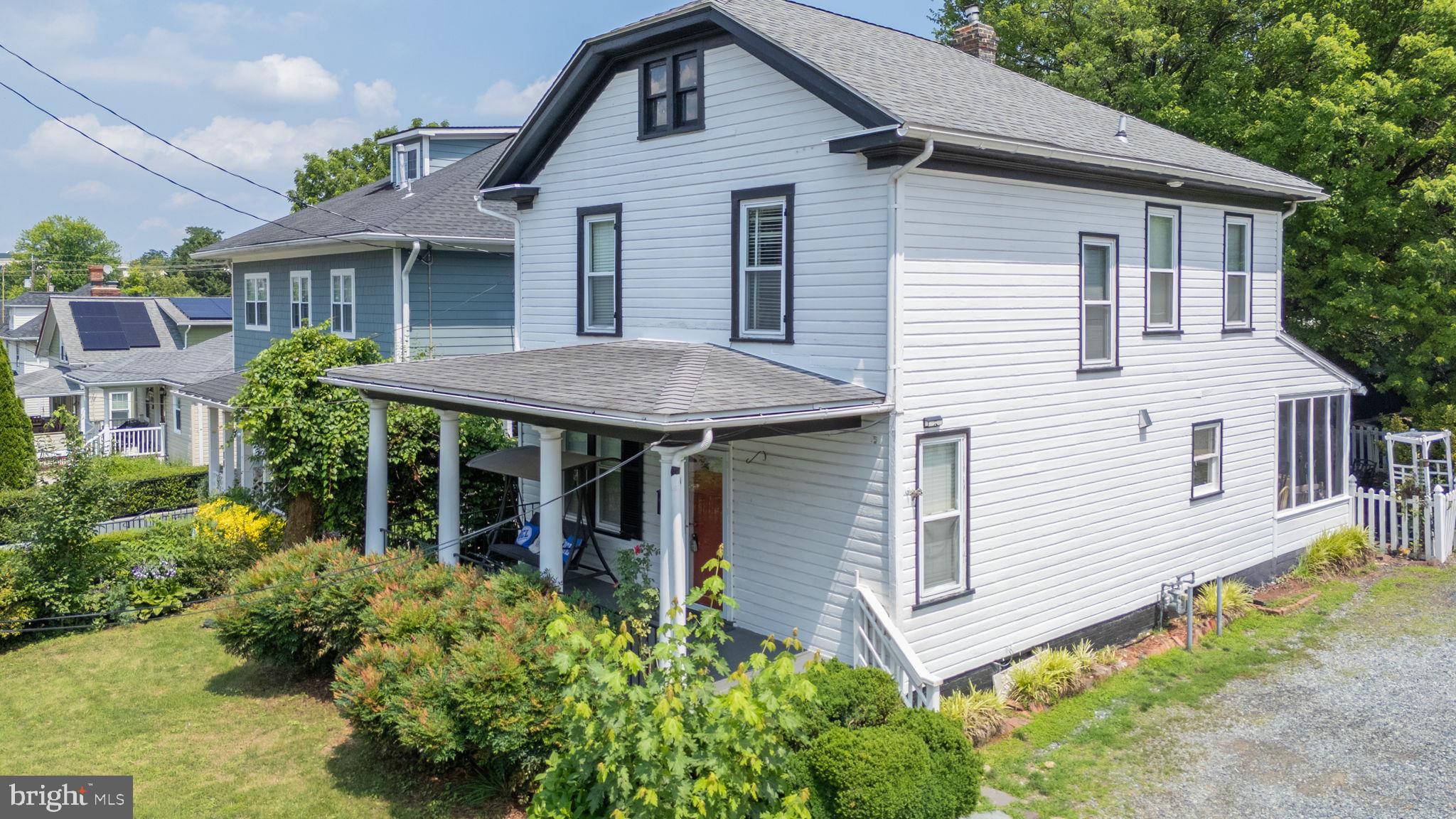 Welcome to this charming and beautifully updated detached home in the highly desirable Observation Heights neighborhood, just moments from downtown Gaithersburg. Blending historic character with modern upgrades, this light-filled residence offers spacious living areas, timeless architectural details, exceptional storage, and wonderful outdoor living.

The inviting front porch sets the tone for this warm and welcoming home. Inside, you’ll find soaring 10-foot ceilings, hardwood flooring, abundant natural light, and classic architectural charm throughout. The main level features a spacious living room, formal dining room, private home office, and a convenient powder room.

The recently renovated kitchen serves as the heart of the home, featuring granite countertops, stainless steel appliances, recessed lighting, ample cabinetry, generous table space, and a newly added exhaust vent for enhanced functionality. The kitchen opens seamlessly to the screened porch and flagstone patio, creating the perfect indoor-outdoor living experience.

Enjoy entertaining, gardening, or simply relaxing while overlooking the expansive, fully fenced backyard. The outdoor space has been thoughtfully enhanced with a newly installed fence, additional gravel parking area, and a second storage shed, providing exceptional flexibility, convenience, and storage.

Upstairs, you’ll find four bedrooms and a full hall bath. The home also offers a full basement, providing additional storage and flexibility. One of the standout features is the large walkable attic space, which offers tremendous storage capacity and potential to be converted into additional usable square footage, subject to any required permits and approvals.

Recent improvements include a remodeled kitchen, updated HVAC system, architectural shingle roof, exterior paint, smart thermostats, plantation shutters, ceiling fans, and added attic and basement insulation for improved energy efficiency.

Observation Heights is one of Gaithersburg’s most charming and walkable neighborhoods, offering easy access to local restaurants, coffee shops, boutiques, parks, playgrounds, and community events. Nearby attractions include Bohrer Park, the Gaithersburg Aquatic Center, walking and biking trails, mini golf, and the skate park. Commuters will appreciate convenient access to the MARC Train, Metro connections, major bus routes, MD-355, and I-270.

This rare move-in-ready home combines historic charm, modern updates, energy-efficient improvements, a full basement, expansive attic storage and future potential, abundant parking, and an exceptional location in the heart of Observation Heights.