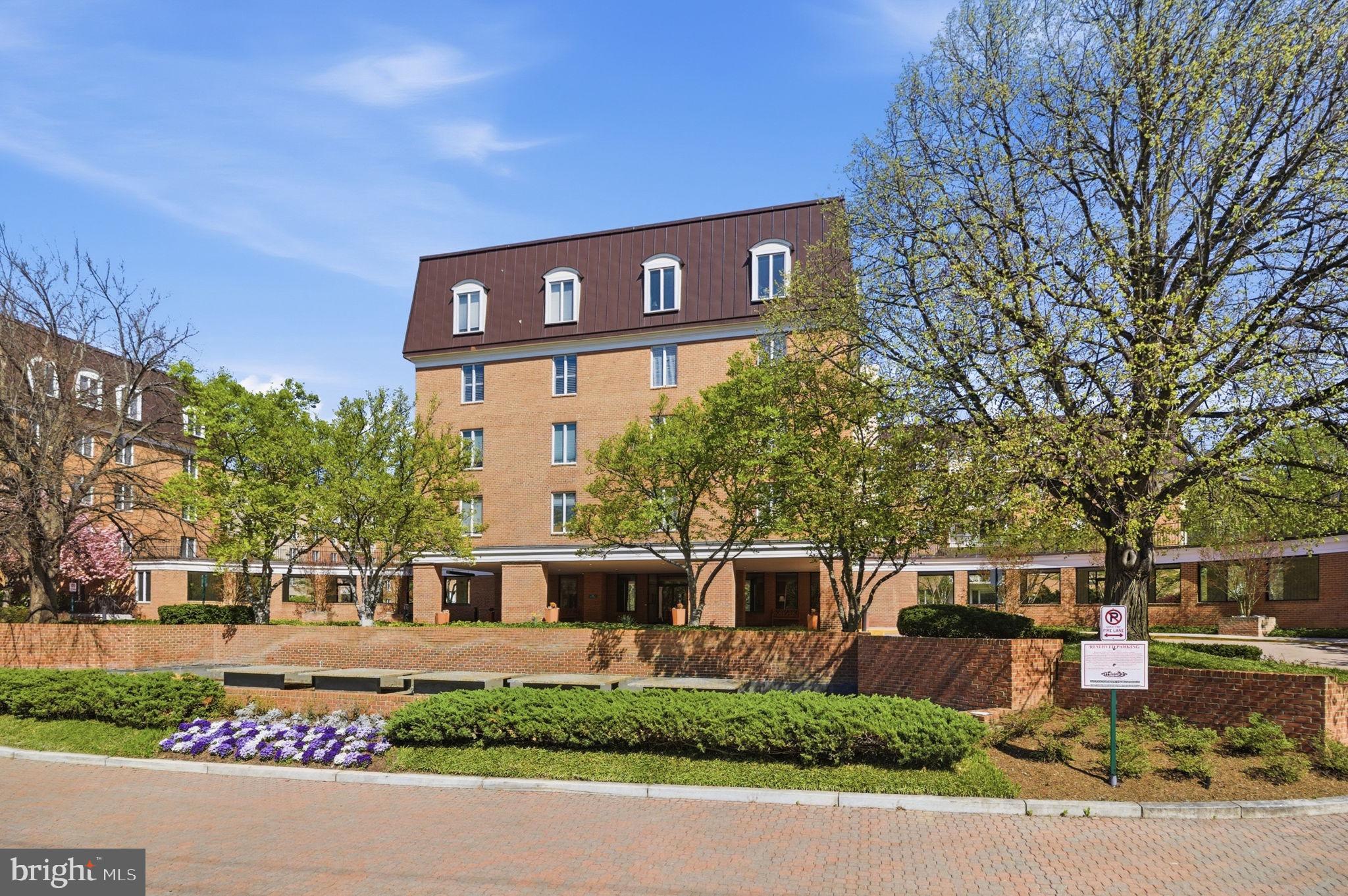 Embrace the tranquility and exceptional space of Unit N-304, a premier corner residence within the stately 8101 Condominiums on Connecticut Avenue. Welcomed by the building's signature water fountains and a 24-hour reception desk, you will find this expansive 1,880-square-foot condo features soaring 9-foot ceilings, large sunlit windows, and a magnificent 17-foot private balcony overlooking a lush tree canopy and a soothing creek below. The thoughtfully designed layout offers a large separate dining room, an updated kitchen, and an inviting living area. The private quarters boast two generously sized bedrooms, a versatile third room ideal for a den or home office, and two full bathrooms offering the convenience of both a soaking tub and a walk-in shower. Enjoy the added ease of an in-unit washer and dryer, along with two garage parking spaces and a large storage bin. This pet-friendly home delivers the ultimate in refined living just minutes from the Beltway, the D.C. line, and downtown Bethesda. Make this your new home today!