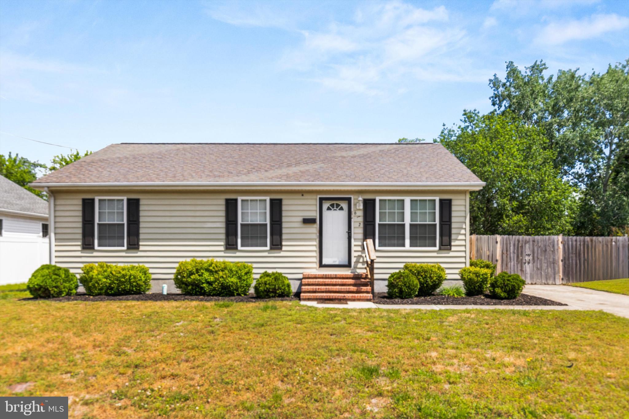 Welcome to a home that offers an opportunity at a price point that is getting harder and harder to find without sacrificing style, space, or functionality! If you’ve been searching for a move in ready single family home under $300,000… this might just be it. Seriously, where are you going to find a well maintained single family home with a fully fenced yard at this price point anymore?! Laurel, Delaware is calling your name.

This 3 bedroom, 2 full bath home offers an inviting layout with updated finishes, a bright open kitchen, and spaces that actually feel comfortable and livable. The kitchen flows beautifully into the dining area and overlooks the backyard, making everyday living and entertaining easy. The neutral color palette throughout the home creates a calm, modern farmhouse feel while still leaving room for your own personality and style.

The bedrooms are generously sized, the bathrooms are fresh and functional, and the fully fenced backyard offers endless possibilities. Whether you have pets, love entertaining or simply want your own outdoor oasis, this yard checks the box. Picture summer cookouts, string lights glowing at night, coffee on the patio, and a space that truly feels like home.

And let’s talk about location. Laurel continues to grow in popularity thanks to its small town charm, affordability, and convenient access to both Maryland and Delaware beaches. You’re within driving distance to Salisbury, Seaford, and the coastline while still enjoying a quieter pace of life. Laurel is known for its local parks, community events, nearby marinas and waterways, and easy access to outdoor recreation including boating, fishing, and kayaking along the scenic Nanticoke River.

Whether you’re a first time buyer, downsizing, investing, or simply tired of watching rent prices climb, this home checks boxes that are becoming increasingly difficult to find at this price point. Functional. Stylish. Fully detached. And ready for its next owner. ***Some photos have been virtually staged. There is no furniture in the home or yard***