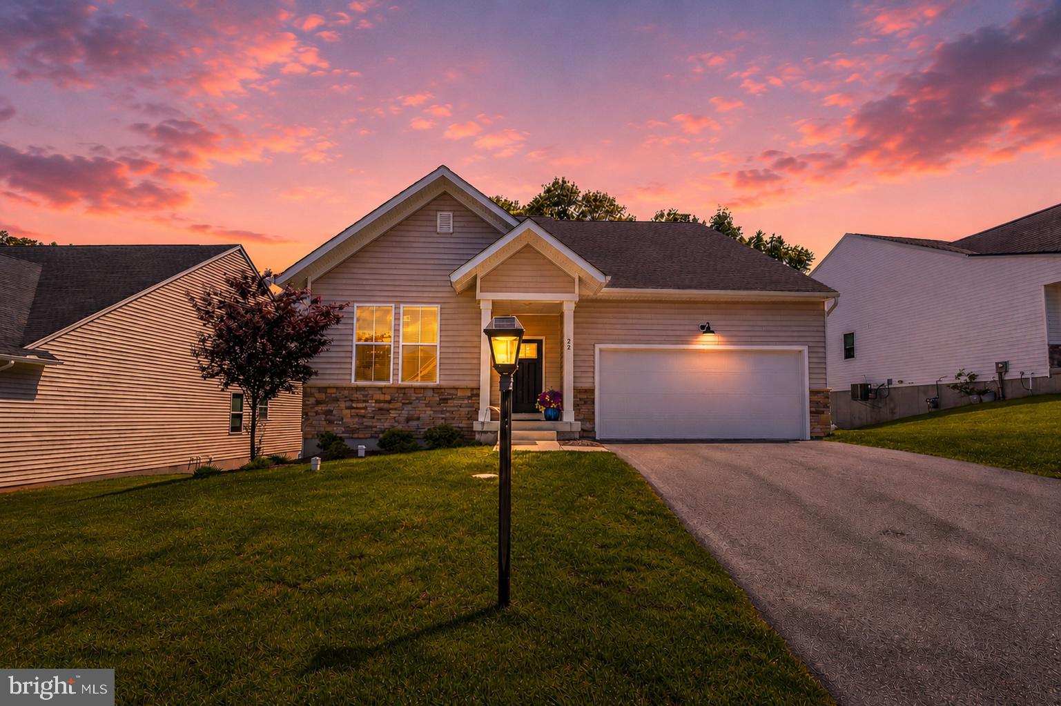 Welcome to 22 Heron Ln, a stunning single-family home in the sought after 55+ community of Hillview. With over 2500 square feet of living space, this beautifully maintained property features 3 bedrooms, 3 bathrooms, and offers spacious living and impeccable design perfect for relaxation and entertainment. The pride in ownership is evident from the floors, to the walls, right up to the custom window treatments.

As you step inside, you're greeted by gleaming hardwood floors that extend throughout the living areas, creating a warm and inviting ambiance. The heart of the home is the chef’s kitchen, thoughtfully designed with stainless steel appliances, a large island, perfect for preparing meals and hosting gatherings. The open layout flows seamlessly into the adjacent rooms, making it an entertainer’s dream.

While the main level is perfect for one floor living, this home offers a nice sized lofted space with a full bedroom and bathroom on a second floor! Perfect for out of town guests, family visits, or a home office/gym/craft space. Upstairs also offers a large storage space.

That's not all! This home also boasts a full walk-out basement, offering additional storage or potential for future customization to meet your needs. This ideal street in the community is unique as it backs to trees and a small stream - providing privacy, peace and serenity when you want to enjoy the outdoor covered deck or spacious back yard.

Situated in a charming neighborhood, 22 Heron Ln is ready to welcome its next owners. With its spacious proportions, premium finishes, and a perfect blend of functionality and style, this is a home you'll be proud to call your own. Don’t miss the chance to make it yours—schedule your private tour today!