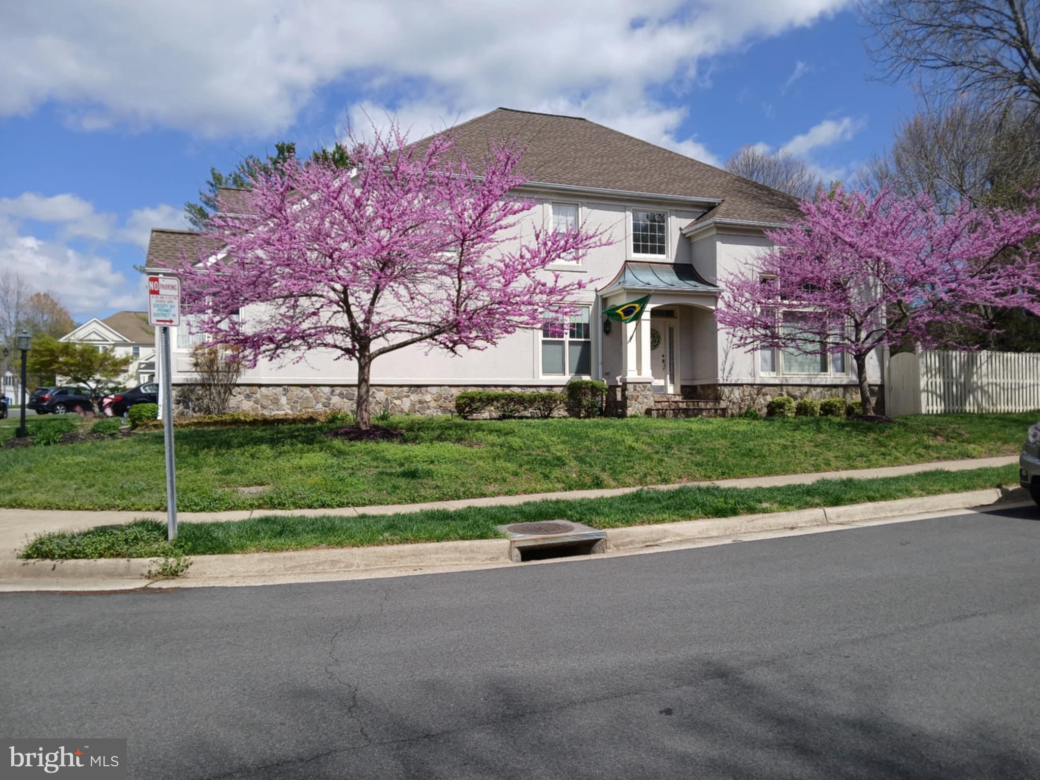 FOR LEASE ONLY:  Occupancy June 1st.  Spacious colonial minutes from Vienna Metro & 66.  Unique corner lot located between 2 cul-de-sacs.  Private fenced yard that backs to common land.  Largest model in neighborhood & has a walk-out basement!  Large 1st Floor MBR (17x13):  luxury Fabrica carpet, lots of closet space with cherry wood custom-made closets, over-sized bathrm with jetted bathtub & separate shower, laundry chute to washer/dryer on lower level.  Main Level: Grand 2-story foyer, large liv. rm with over-sized window, lots of natural light, hardwood floors & custom shades in liv. rm & din. rm, upgraded with crown molding, chair railing, shadow boxes, French patio doors.  TV Room adjacent to kitchen with gas fireplace, stainless steel appliances, granite counters, pantry, extra refrigerator in the 2-car garage.  Upper Level: 3 large bedrms, luxury Fabrica cream wall-to-wall carpeting & Pella between-the-glass shades.  Large bedrm (17x14) with Jack & Jill bathrm. Adjoining bedrm has separate large storage rm & walk-in closet.  Third bedrm has lots of natural light & private bathrm.  Custom Finished Lower Level:  Wide walk-out with wrought iron steps & railing, tumbled marble floors, upgraded full bath,  office/den with over-sized French doors, large closet plus storage custom vanity & sink outside office, large ceiling fan with built in heating element for cozy recreational space in the winter, luxury Fabrica carpet in media room,  wired for Surround Sound, great for entertaining, extra storage space in the laundry rm.  HOA Fee paid by Landlord! This is shown by appointment only. Schedule 24 hours ahead of time.