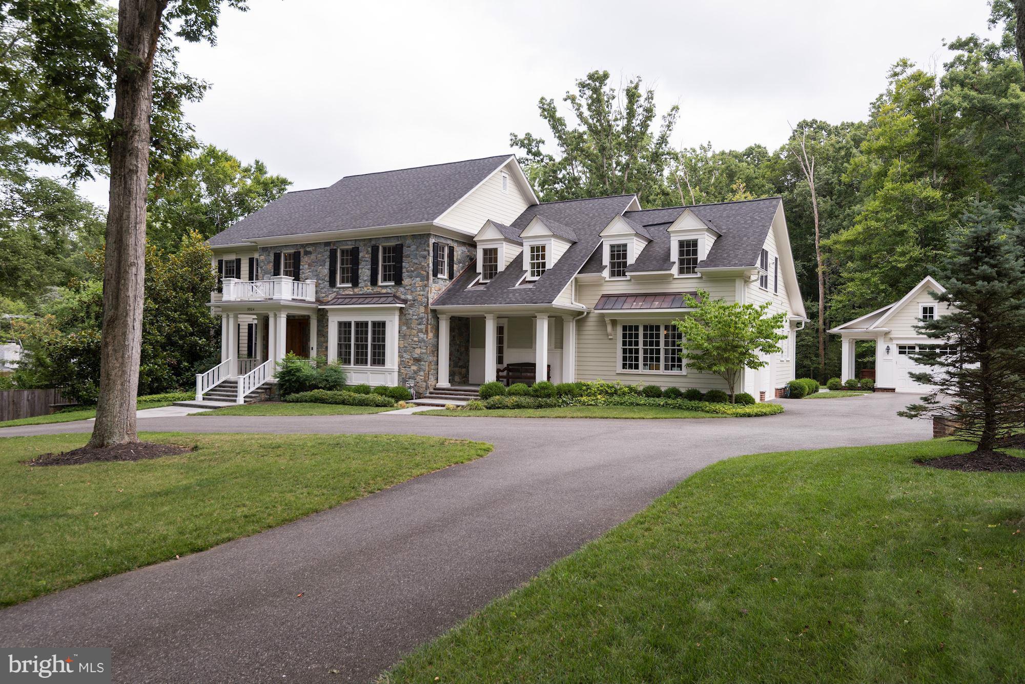 Custom home designed by Studio Z, on spectacular lot w/in walking distance to the Village backing to a bird sanctuary! Fabulous interior spaces, exquisite detailing & craftsmanship. Chef's eat in Kitchen, and Family Room, entertaining size D.R., paneled Library, covered terrace w/ fp. 5 BR & 4 BA up,MBR suite w/ Balcony, walk out LL w/ game, fam rm, exercise rm,  BR & BA.