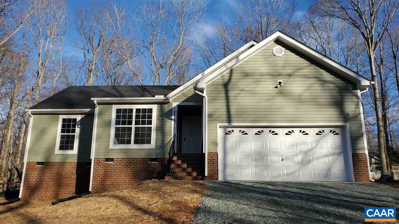 PRE-SOLD!! Waverly Wilson Hybrid located on a premium lot at Lake Monticello with an open floor plan, 2x8 kitchen island with 12" overhang, stainless appliances, double bowl vanity and 5' shower in the master bath and elongated toilets in each bath.  Photo is similar to a completed model.,Formica Counter,Wood Cabinets,Fireplace in Great Room