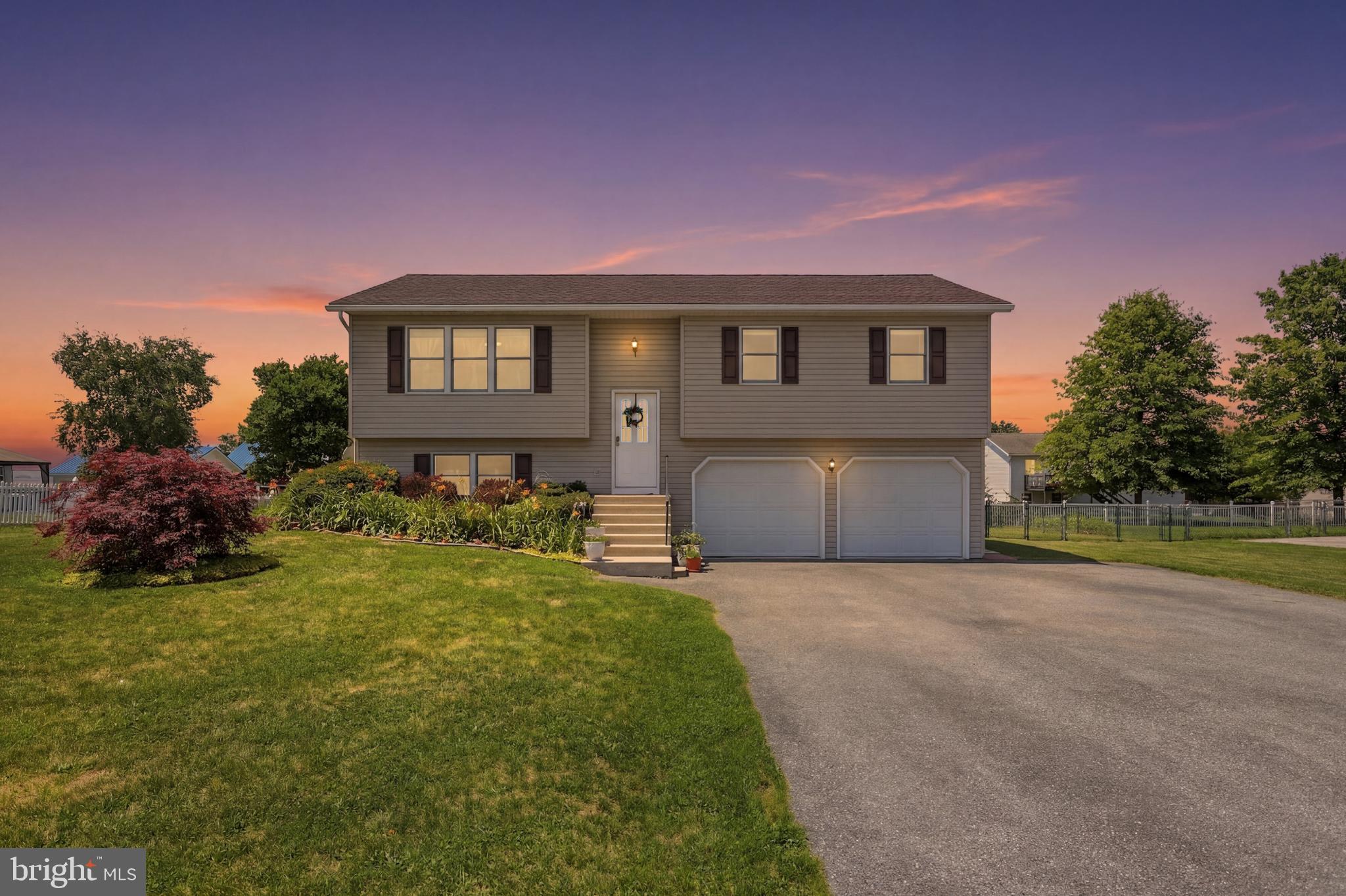 Welcome to 274 Pattison Drive! Located in the desirable Kaphoe Development, this well-maintained bi-level home offers a functional layout, thoughtful updates, and convenient access to everything Shippensburg has to offer. The main level features a large living room, inviting kitchen and dining area, three bedrooms, and two full bathrooms. The primary bedroom includes a private attached bathroom that has recently been updated with a new vanity, lighting, and mirror. The kitchen has also seen recent updates, with the microwave, range, and dishwasher all replaced within the past two years. All appliances convey with the home, including the washer and dryer. Additional major improvements include a new heat pump and central A/C (2020) and a new hot water heater (2025). The finished lower level provides additional flexibility with two finished rooms ideal for a home office, guest bedroom space, fitness room, or hobby area. This level also includes a recently updated laundry room and half bathroom featuring new flooring, fresh paint, updated lighting, and a new vanity. Enjoy outdoor living on the spacious rear deck overlooking the fenced backyard, perfect for relaxing or entertaining. The attached two-car garage provides convenient storage, while the oversized asphalt driveway offers ample parking for up to six vehicles. Conveniently located just minutes from schools, shopping, restaurants, Route 11, and Interstate 81, this move-in-ready Shippensburg home offers the space, updates, and location you've been searching for. Schedule your private showing today!
