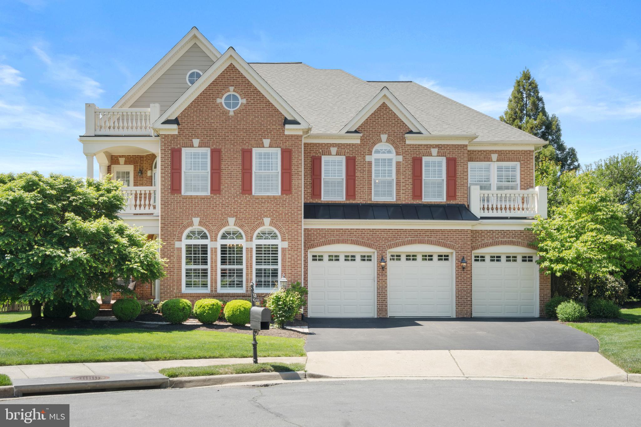 Once in a while, a unique and gorgeous home becomes available on the market in the Broadlands, and WOW, this is it! Welcome to a stunning 5-bedroom, 5.5-bathroom, Van Metre Hemingway model offering nearly 7000 sq ft of living space. It has been extensively upgraded and customized and is move-in ready. Situated on a quiet cul-de-sac with access to all of the amenities that Broadlands has to offer. This home has many upgrades, including a brand new roof (2026), a gorgeous custom kitchen (2020), fully renovated and stylish bathrooms (2021/2022), gorgeous hardwood flooring, outdoor hardscaping, and new carpet (2026). A stand-out feature of this luxury home is the half-acre lot, one of the largest in the Broadlands. 

As you drive up Withers Grove Court, you will immediately be struck by the curb appeal and presence of this amazing home.  The hardscape and mature greenery have been meticulously maintained, and you have plenty of space to park in the 3-car garage. 

Walk in and be captivated by the grand staircase, one of two in this home.  The bright, light foyer leads you to the sizable living room and dining room, both with floor-to-ceiling windows, and continues into a one-of-a-kind "Culinary Haven." The kitchen is a dream (renovated by a designer that has worked on a number of luxury homes in Ashburn) with double wall ovens, a gas cooktop, a hood vent, a built-in microwave, and a large center island. The kitchen flows into a gorgeous morning room with floor-to-ceiling windows and then to your backyard oasis, featuring a maintenance-free covered deck and a patio with fire pit, perfect for cozy evenings. The main level also includes a family room with a gas fireplace - a wonderful place to gather with friends and family, as well as a private home office, and a stylish half bath.

Upstairs, the spacious primary bedroom offers TWO walk-in closets and a true spa-like ensuite with a rectangular free standing tub, dual vanities and a HUGE walk-in shower that needs to be seen in person. There are four additional sizable bedrooms; two have their own ensuite bathrooms, and the other two share a Jack-and-Jill full bath. All bathrooms have been fully renovated and are gorgeous! The laundry room is an amazing space with lots of cabinets and counter space, making laundry day more fun. From the laundry room you can step outside on the front balcony for some fresh air and take a quick break.

The fully finished lower level features a large recreation room with a second gas fireplace and stylish built-ins, a renovated fifth full bath, and a bonus room that can be used as a gym or turned into a guest room. There is also a unique "Arts and Crafts" room for an artist, or perfect for wrapping gifts and creating projects. The rest of the house includes a 3-car garage and an irrigation system to keep your lawn green.
Living in Broadlands means access to top-rated schools, multiple pools, sports courts, a fitness center, walking trails, and playgrounds. With easy access to the Dulles Toll Road, Silver Line Metro, shopping, dining, and entertainment, this home truly has it all. Don’t miss this rare opportunity to own a spacious, upgraded home in one of Ashburn’s most desirable neighborhoods. Make this YOUR home!