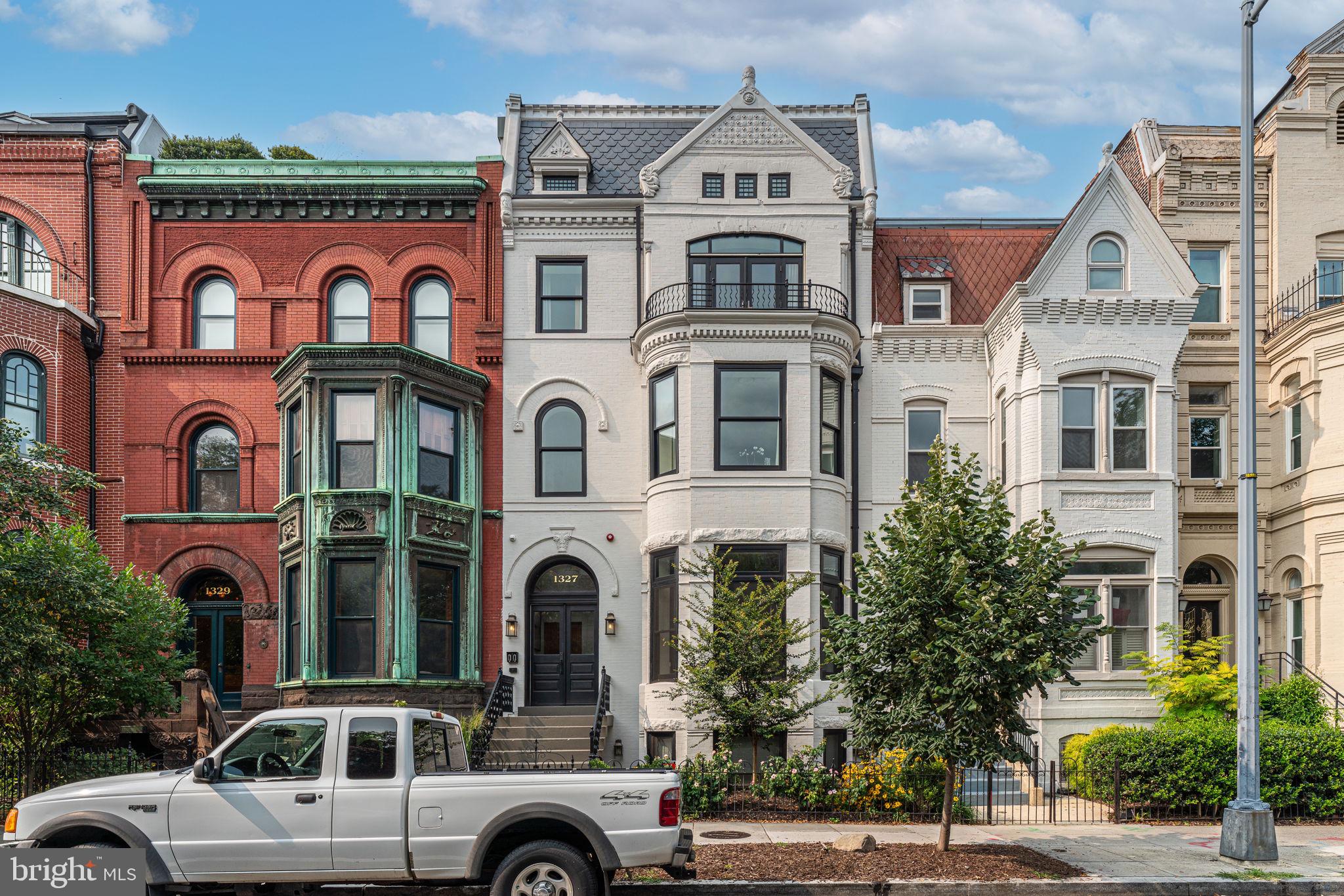 Welcome to 1327 R St NW #2 — a distinctive 4-bedroom, 4 full bath, and 2 half bath residence developed in 2021, blending contemporary luxury with rich DC history. Originally commissioned in the 1880s by George Prince and designed by renowned architect Thomas Franklin Schneider, the building later became known as the MuSoLit Club and has since been thoughtfully reimagined into a boutique condominium.

Spanning two levels, this residence offers an exceptional layout for both everyday living and entertaining. The main level features a state-of-the-art gourmet kitchen with a butler’s pantry, wet bar with ice maker and wine fridge, and expansive living and dining areas filled with natural light. A library nook provides a quiet retreat, while a guest suite with a full ensuite bath and an additional powder room complete this level.

The upper level hosts a spacious primary suite with a custom walk-in closet and spa-inspired bath. Two additional bedrooms, each with ensuite baths, offer privacy and comfort, along with an additional powder room and conveniently located laundry. One of the bedrooms also features a private balcony.

Additional highlights include a private rooftop terrace with terraced gardens, ideal for outdoor entertaining, and secure one-car parking.

Ideally located in Logan Circle, with convenient access to dining, shopping, and vibrant city living.