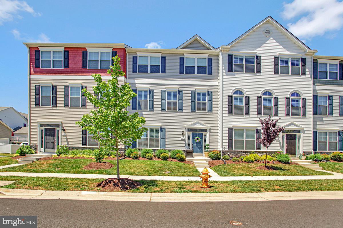 ✨ BETTER THAN NEW & ONLY 2 YEARS YOUNG! ✨

Rare opportunity to own a nearly new Lacrosse Homes townhome. There are currently no new Lacrosse Homes townhomes available in the community, making this beautifully upgraded residence an exceptional find. Offering nearly 2,300 square feet of thoughtfully designed living space, this stunning 4-bedroom, 3.5-bath home has been barely lived in and shows like a model.

Built just two years ago, this home stands apart from many older resales in the neighborhood, offering modern construction, energy-efficient systems, propane heat, and gas cooking. From the moment you enter, you'll appreciate the bright and open feel created by 9-foot ceilings, abundant natural light, and luxury vinyl plank flooring that extends throughout all three levels and staircases.

The entry level features a highly desirable bedroom suite with a full bath offering convenient access from both the bedroom and foyer, making it ideal for guests, multigenerational living, or a private home office.

At the center of the home is the beautifully appointed kitchen featuring 42-inch white cabinetry, granite countertops, stainless steel appliances, gas cooking, and a spacious center island perfect for meal preparation, casual dining, and entertaining. The open-concept design seamlessly connects the kitchen, dining, and living areas, creating an inviting space for gatherings large and small.

Step outside to the spacious, low-maintenance deck featuring composite decking, vinyl railings, and an electric awning. Whether you're enjoying your morning coffee, hosting a summer barbecue, or unwinding after a long day, this outdoor living space is designed for year-round enjoyment.

The upper-level primary suite offers a luxurious retreat featuring a double-bowl vanity, ceramic tile flooring, and a spacious walk-in ceramic tile shower. Additional bedrooms offer plush carpeting for comfort, while all bathrooms are finished with ceramic tile.

Thoughtful upgrades throughout include custom wood blinds on every window, adding elegance and privacy while complementing the home's upscale finishes. The attached two-car garage features an automatic door opener and overhead metal storage racks, providing valuable storage and organization.

Located just minutes from the Bay Bridge, this home offers the perfect blend of convenience and Eastern Shore charm. Residents of Ellendale enjoy access to outstanding amenities including a clubhouse, resort-style swimming pool, walking trails, tot lot, kayak launch, fishing pier, and neighborhood parks.

🏡 Luxury, location, lifestyle, and value—all wrapped into one exceptional home.