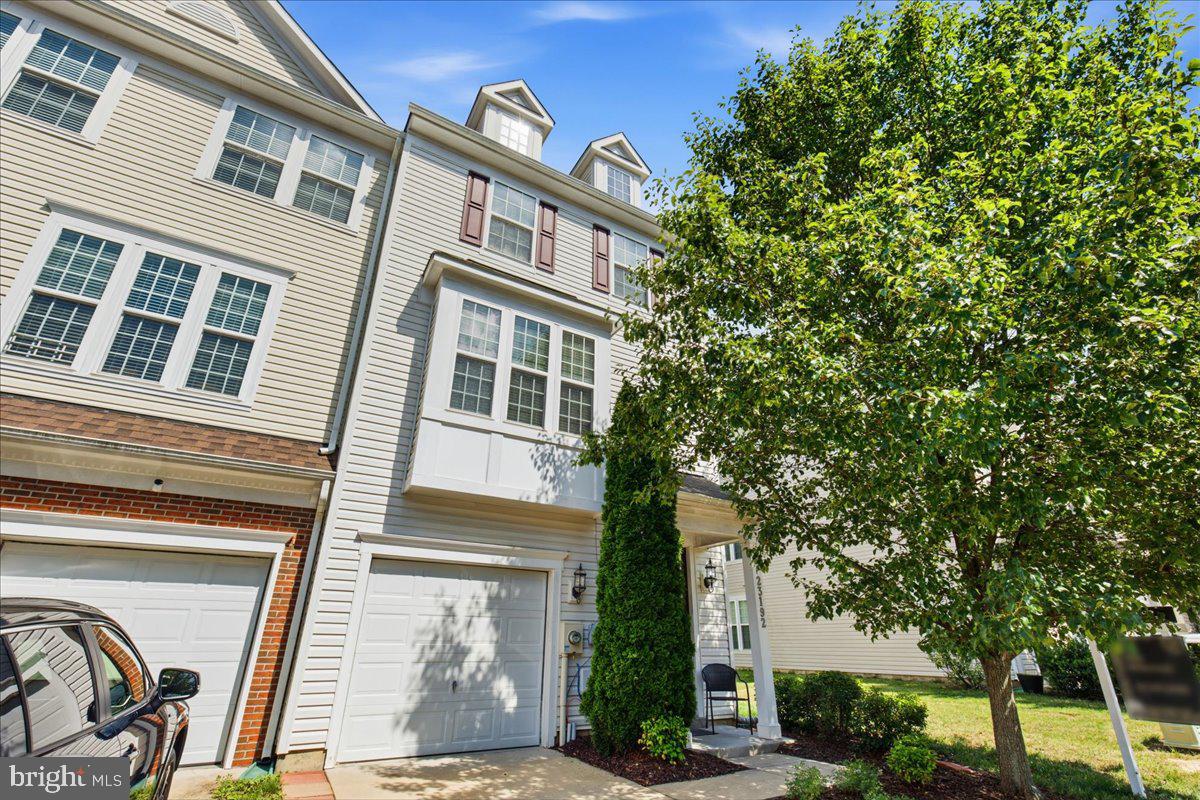 Welcome to 23192 Mountain Laurel Lane, a beautifully maintained end unit townhome tucked into the heart of California, Maryland. Offering three finished levels, a 1-car garage, and a functional open layout, this home is designed for both everyday living and easy entertaining. The main level features a bright and inviting floor plan with comfortable living and dining spaces, a spacious kitchen with granite counter tops, gas stove, and kitchen island...a great flow throughout. Slider to deck overlooking private backyard...perfect for your morning coffee! Upstairs, you’ll find 3 well-sized bedrooms, including a private primary suite with its own full bath w/ dual sinks and walk in closet. The finished lower level adds even more versatility with additional living space that can be used as a rec room, home office, gym, guest area, or playroom or 4th bedroom and full bathroom! Sider to backyard with brick patio! Located in a convenient community close to shopping, dining, commuter routes, Pax River, schools, and everyday essentials, this home offers the perfect blend of comfort, convenience, and low-maintenance living in Southern Maryland. Schedule your showing today!