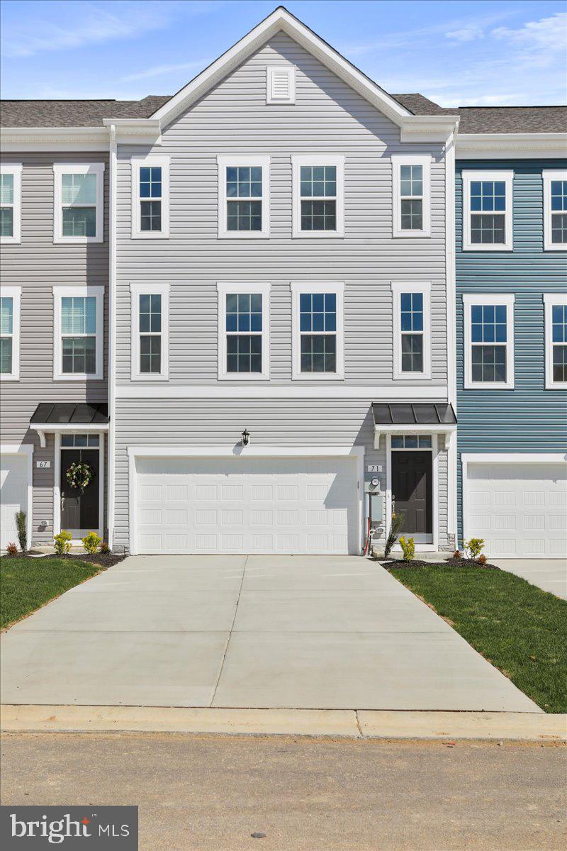 Ready to Move In! Overlook at Riverside - Brand New Townhome

This stunning townhome features 4 bedrooms and 3.5 baths. Upon entry, you'll find a finished Recroom with a full bathroom adding extra space. The main level boasts luxury vinyl plank flooring throughout, a spacious living room with a powder room, and an eat-in kitchen with an island, granite countertops, stainless steel appliances, and a spacious deck.

The primary suite includes a generous walk-in closet and an en suite bath with a dual sink vanity and an oversized seated shower. The upper level is completed by two secondary bedrooms, a full bath, a linen closet, and a centrally located laundry room.

Additional features include a double car garage, a large driveway that can accommodate four cars, and additional guest parking. The community offers free amenities such as a dog park, children's park, basketball court, tennis court, and recreation area.

Located in a prime spot for I-81, Rt 11, and I-70 commuters, this home offers mountain views, is within walking distance to shopping and restaurants, and provides access to Spring Mills schools. It's also close to the interstate and just minutes from the MD line. This rental won't last long!