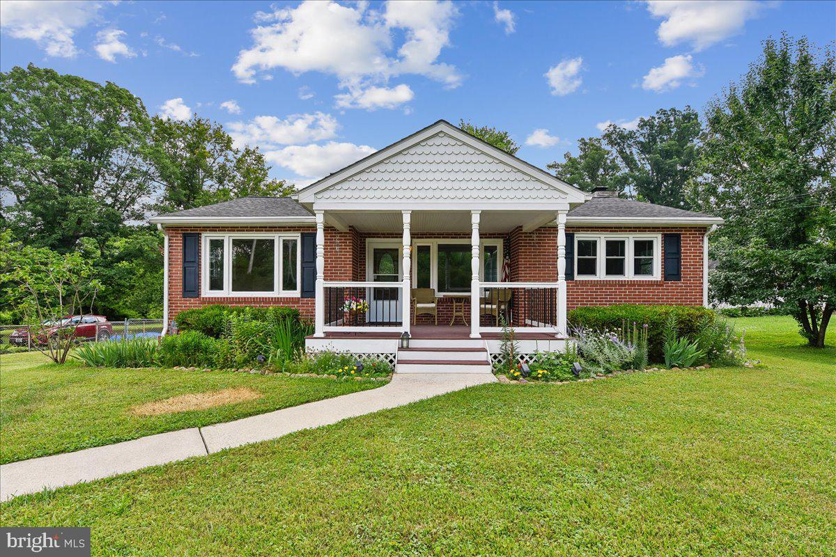 Simple Living-Great Space- Inside and Out. This well-kept  rancher offers the perfect mix of charm, space, and updates. Inside, you’ll find solid hardwood floors, a bright kitchen with ceramic tile, and three comfortable bedrooms with two full baths. The finished walk-out lower level adds incredible living space, featuring large windows, new LVP flooring, a full bath, and a cozy stone fireplace with a built-in woodstove—perfect for relaxing year-round.
Step outside and enjoy shady summer days on the covered front and rear porches, or entertain on the paver patios by the above-ground pool. The nearly one-acre lot is level, partially wooded, and fenced, offering both privacy and room to enjoy. There’s also a storage shed for tools and pool supplies, a driveway for multiple cars, and beautiful landscaping throughout. With HVAC updated in 2024, this home is move-in ready and full of value.  Replacement windows installed 2010,  Kitchen update, front porch roof added in 2012.  New vinyl siding on house in 2020. The location is hard to beat. It has a peaceful  "country vibe" but you are only minutes to Bel Air,  Rt 40/Rt 24 and I-95. Welcome Home!