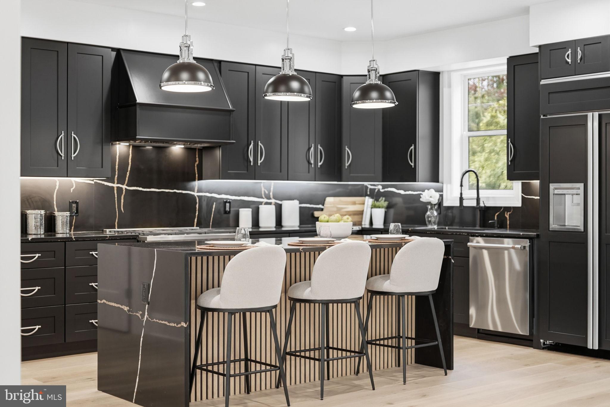 EXCEPTIONAL NEW CONSTRUCTION IN KENT-PALISADES!

Thoughtfully designed for modern living, this nearly 4,500 sq. ft., expansive six-bedroom, five-bath residence offers the perfect balance of sophisticated design, everyday comfort, and energy-efficient performance in one of Washington's most desirable neighborhoods.

Sunlight fills the home through oversized double-pane windows, creating bright, inviting spaces while enhancing sound reduction and year-round comfort. Wide-plank engineered hardwood flooring, soaring ceilings, and an open, flowing floor plan create a seamless backdrop for both entertaining and everyday living.

At the heart of the home is a stunning gourmet kitchen designed to impress. Dramatic black marble countertops and backsplashes provide striking contrast against the warmth of the surrounding living spaces, while premium Café appliances, a smart refrigerator, and abundant cabinetry deliver exceptional functionality. A butler's pantry with wine storage and a convenient mudroom make hosting effortless, whether gathering indoors or extending celebrations outdoors.

The living room is both elegant and welcoming, anchored by a sleek gas fireplace with a substantial custom mantle, while the dining area showcases refined picture molding that adds timeless architectural character.

A main-level bedroom with a beautifully appointed full bath offers outstanding flexibility as a guest suite, private home office, or multigenerational living space.

Designed with comfort and efficiency in mind, the home features insulated attic storage, spray foam insulation throughout, and high-performance double-pane windows, contributing to quieter interior spaces and approximately 30% lower utility costs during both winter and summer months compared to traditionally insulated homes.

Upstairs, the luxurious primary suite serves as a private retreat. Multiple closets, including a custom walk-in closet, provide abundant storage while the spa-inspired bath features heated floors, dual shower heads, rich black stone finishes, a rain shower, private water closet, and expansive windows that fill the space with natural light.

Additional upper-level bedrooms are thoughtfully configured to accommodate a variety of lifestyles, including two bedrooms connected by a marble Jack-and-Jill bath and an additional en-suite bedroom with generous storage.

The fully finished lower level offers exceptional versatility with a spacious recreation and media room lined with custom built-in bookcases ideal for movie nights, gaming, fitness, or work-from-home needs. Direct garage access, a separate exterior entrance, and an additional guest suite further enhance the home's flexibility.

Perfectly positioned along the MacArthur Boulevard corridor, this residence places you moments from the best of the Palisades. Enjoy neighborhood favorites including BlackSalt and Et Voila!, local markets, coffee shops, and everyday conveniences, while nearby Battery Kemble Park and the C&O Canal Towpath provide easy access to nature and outdoor recreation. Commuting is effortless with convenient connections to Downtown DC, Georgetown, Bethesda, Arlington, and major employment centers throughout the region.

A rare opportunity to own a modern, energy-efficient luxury home with exceptional space, thoughtful design, and an unbeatable Kent-Palisades location.