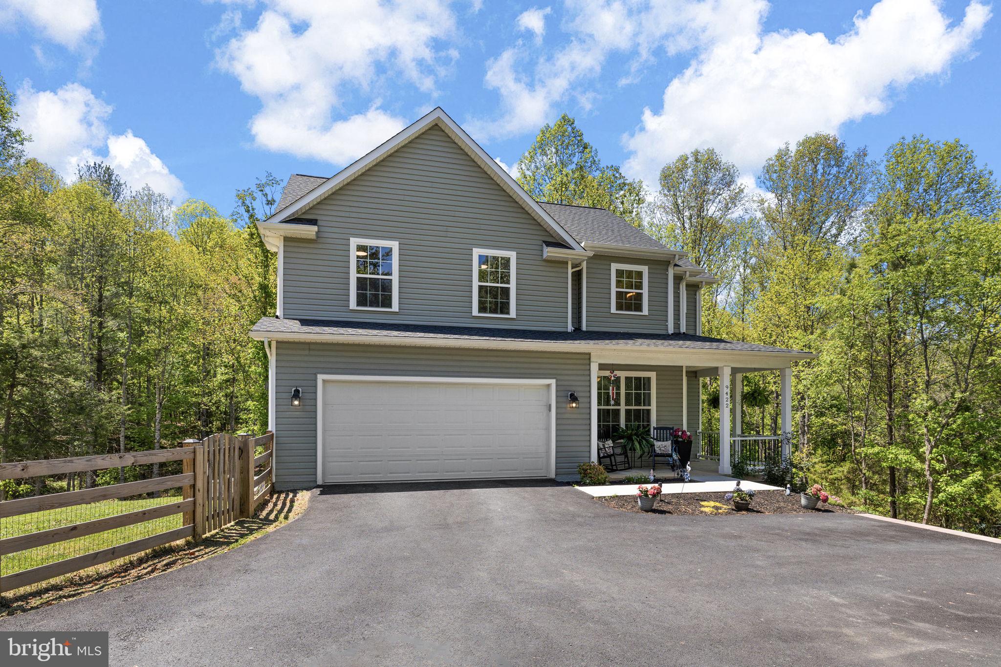 Welcome to your "like-new" colonial retreat! Perfectly situated on a sprawling 2.08-acre lot, this stunning residence combines classic architectural charm with modern, high-end finishes. As you step inside, you’ll immediately notice the durable and stylish luxury vinyl plank flooring that flows throughout the main living areas, offering both beauty and easy maintenance.  The heart of the home is a gourmet kitchen designed for the modern chef, featuring gleaming granite countertops and a full suite of stainless steel appliances. Whether you are hosting a formal dinner or a casual brunch, this space is as functional as it is beautiful.  Retreat to the primary suite, where you'll find a spectacular owner’s bath—a true spa-like sanctuary designed for ultimate relaxation.   Enjoy peaceful mornings or breezy evenings overlooking your private, expansive acreage from the comfort of the screened porch.   The massive, full walkout basement offers a blank canvas for your vision—ideal for a future home theater, gym, or additional living space.
Located in a sought-after neighborhood with the privacy of over two acres, this home offers the rare opportunity to enjoy a "new construction" feel without the wait.
Don't miss your chance to own this colonial gem—schedule your showing today!