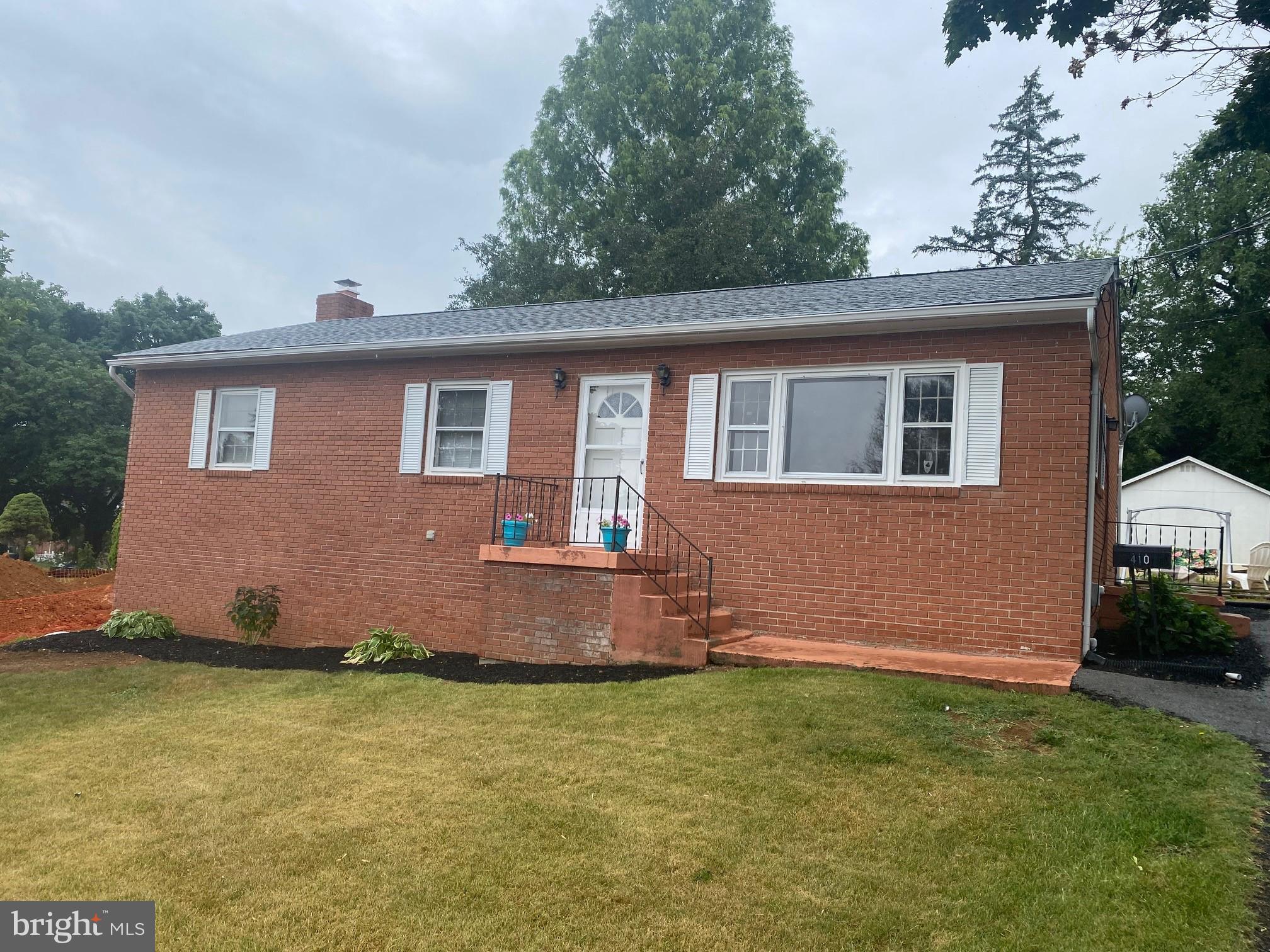This spacious brick rancher is in a great commuter location! It features 3 bedrooms and 1 bath. There is a large driveway for plenty of off-street parking. Inside the home you have a large living room with hardwood floors. There is a nice dining room with hardwood floors and a decorative light fixture. The large kitchen is airy and bright. Down the hall you have 3 large bedrooms with hardwood floors and ceiling fans. The hall bath features easy care vinyl floors and an extended single bowl vanity. The lower level of the home is a full, unfinished basement. It includes a wood burning fireplace with a woodstove insert. There is a lot of space for storage or could be a rec room. It houses the laundry machines and hot water heater. Outside the home is a nice level rear yard. It includes raised flower beds and a large storage shed. If this sounds good to you call for more info today! *Please note that taxes reflect Class III status as the property was a rental. If purchased by owner occupant prior to July 1, 2026, taxes will revert to Class II for 2027.