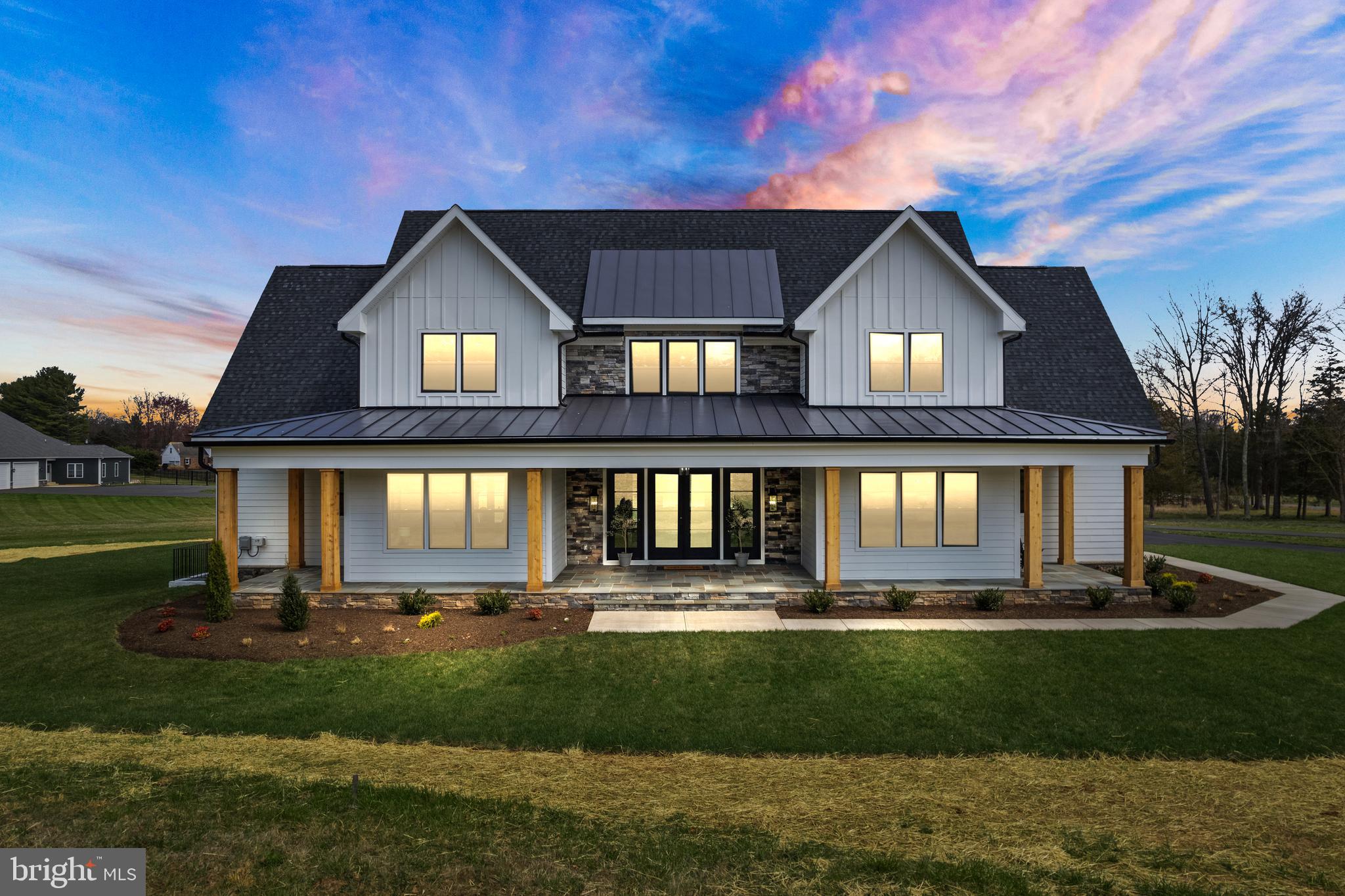 Introducing the magnificent Hamilton model, soon to be built in the prestigious Willowbrook Estates. Nestled on homesite/lot 1, this sprawling property spans an impressive 5.84 acres, offering you the ultimate in space and privacy.

Prepare to be captivated as you approach the grand entrance, welcomed by the stately front porch and its majestic doors. Need garage space? This huge three-car garage has room to spare. 

Step inside, and you'll be greeted by a beautifully designed open space, filled with an abundance of natural light streaming through large windows. The centerpiece of the living area is a grand fireplace, adding warmth and sophistication to the ambiance.

Luxurious living awaits you on the main level, with the primary bedroom boasting a spacious walk-in closet and a lavish en-suite bathroom. The primary bedroom also opens up to a vast porch, complete with an inviting outdoor fireplace, where you can relax and savor the beauty of the surrounding nature. Adjacent to the primary wing, you'll find an overflow room that can be transformed into a cozy seating area, a home office, or even a second living room - the choice is yours.

But that's not all. The main level of this exceptional home offers even more. A mudroom provides a practical space to keep things organized, while a generous walk-in pantry ensures you have ample storage for all your culinary needs. A main-level laundry room, one of two offered in this well-designed home. The dining area, bathed in natural light, creates a welcoming atmosphere for family meals and entertaining guests. And the kitchen? Prepare to be amazed. With high-end appliances, stylish finishes, including a farmhouse sink and beautiful engineered hardwood floors, and a large island, this kitchen is a chef's dream come true.

As you venture into the basement, you'll discover additional space to utilize, complete with another full bathroom. No beams in your way keeping the space open. The recreation space is finished, and there are options to customize a wet bar and additional rooms.

On the upper level, four additional bedrooms and two full bathrooms await, providing comfortable accommodations for family and guests. The space above the garage offers endless possibilities, whether you need extra storage or envision a future expansion. Convenience is key, with a second laundry room located on the second floor, making chores a breeze. And let's not forget the loft, a versatile space that can be used to suit your needs.

If a large porch is on your wishlist, the Hamilton model has you covered. This expansive porch provides ample space for outdoor living and entertaining, and the addition of a large fireplace adds an element of warmth and coziness.

Water Creek Homes, renowned for their exceptional craftsmanship and attention to detail, is the builder of this prestigious estate neighborhood. Don't miss out on the opportunity to own this extraordinary property in Willowbrook Estates. Seize the chance to indulge in luxurious living, surrounded by nature's beauty and exquisite design. Your dream home awaits to be built on homesite/lot 1.

Photos and videos shown are from builder's model.  Finishes and options may vary from photographs and videos.
