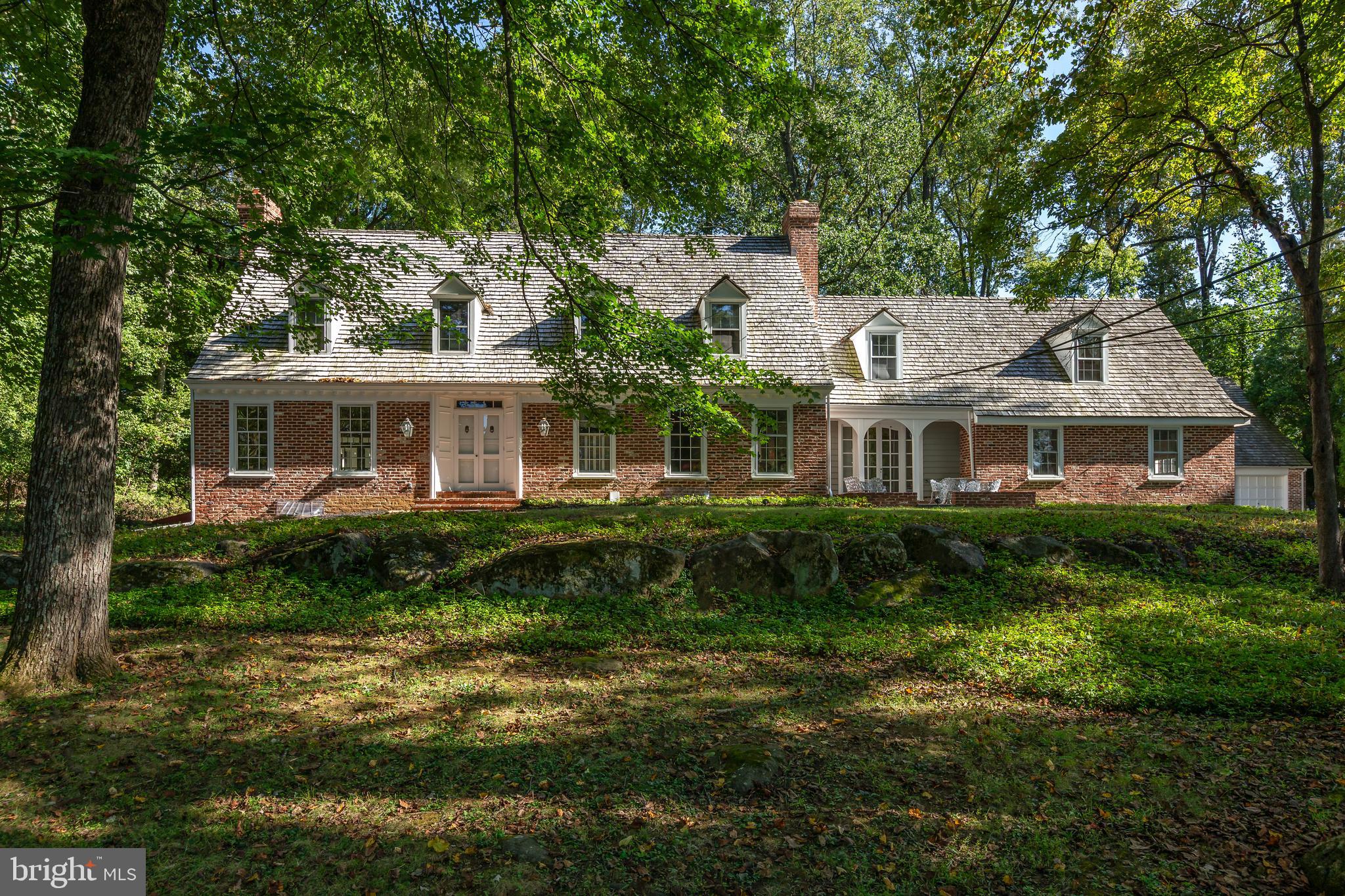 Welcome to 8 Foxchase Road—an inviting home set on a gorgeous and private two-acre lot in the coveted Radnor Hunt neighborhood. Tucked away in idyllic Willistown Township, this property offers the perfect balance of tranquility, natural beauty, and convenient access to the Radnor Hunt and the Main Line.
Surrounded by rolling Chester County countryside and just minutes from Radnor Hunt, White Manor, Applebrook, and Waynesborough Country Clubs, the setting feels peaceful and secluded, yet close to excellent public and private schools, shops, restaurants, and commuter rail stations.
The three-bedroom, two-and-a-half-bath Williamsburg Colonial was thoughtfully built and lovingly maintained by its original owners. Inside, you’ll find a bright and welcoming atmosphere enhanced by large windows, skylights, and views of the surrounding greenery. Traditional details such as brick pavers, custom built-ins, and substantial millwork give the home timeless character.
Enjoy seamless indoor-outdoor living with French doors leading to a sunroom, a formal dining room that opens to the flagstone patio, and a breakfast nook with views of the expansive backyard. Whether hosting gatherings or savoring quiet moments, the private setting creates a true retreat.
Upstairs, the versatile layout includes the primary suite, two additional bedrooms, and a flexible loft space with built-ins. Unfinished bonus areas—including the second floor of the detached garage—offer endless potential for a studio, office, or guest space.
Outdoors, the two-acre lot is a private haven with mature trees, open lawn, and multiple spots for al fresco dining, entertaining, or simply enjoying the serenity of the setting.
Surrounded by prestigious properties and in the heart of Radnor Hunt, this understated elegant home is for those seeking privacy, natural beauty, possibilities and accessibility, 8 Foxchase Road is an unmatched opportunity.  Shown by appointment.