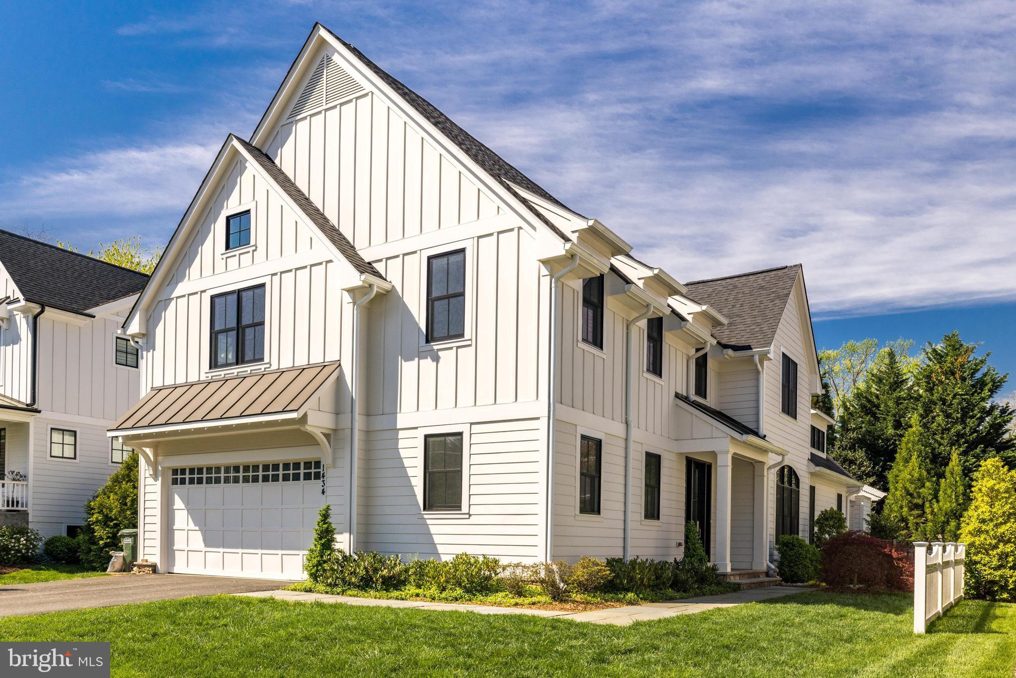An exceptional opportunity for a better than new custom home built by Buchanan-Price, a local McLean builder known for their quality and attention to detail. Much bigger than it looks, this modern farmhouse offers approx. 6,100 SF with stunning 10’, 13’ and 16' ceilings on the main level, a MAIN-LEVEL Primary Suite, designer finishes, and a fantastic outdoor space that will captivate even the most discerning buyer. Located on a great street in the heart of the Village of West McLean, a sought-after community with excellent proximity to downtown McLean.

 Step inside and be wowed by the open floor plan, designed by architect Richard Foster of Foster Zimmerman. This home effortlessly blends sleek, contemporary design with soaring ceilings and farmhouse charm. From the Mahogany front door to the custom white oak, wide plank flooring, every detail has been carefully curated to ensure luxury and comfort at every turn.  

 The showstopper on the main level is a great room with 16’ ceilings + windows and gorgeous oversized gas fireplace, adjacent to the main level primary suite with 13’ ceiling. The suite with spa bath provides the ultimate retreat with its volume ceiling and luxurious finishes. Upstairs, there are 4 additional bedrooms & 3 baths that all open onto an upper family room. Bonus stackable laundry unit was added for convenience. 

 Gather in the light-filled kitchen, where modern high-gloss cabinetry with soft closing hardware and top-of-the-line appliances create a culinary haven. Designer lighting illuminates the kitchen island, while a waterfall countertop and custom backsplash adds to the sophistication. The home offers two laundries plus an additional laundry hookup in the mudroom, and an attached two-car garage complete with custom storage and an epoxy floor. Relax and unwind in the delightful outdoor living room, with a gas fireplace and surrounding pergola, perfect for enjoying cozy evenings under the stars. Entertain with ease in the finished lower level, complete with a wet bar and gas fireplace with stone surround, the 6th bedroom or office and full bath, laundry room, workshop and large storage room. 
￼
 This exceptional home offers the perfect blend of sophistication and warmth. Don't miss your chance to experience luxury living at its finest – schedule a visit today and make this dream home yours.
