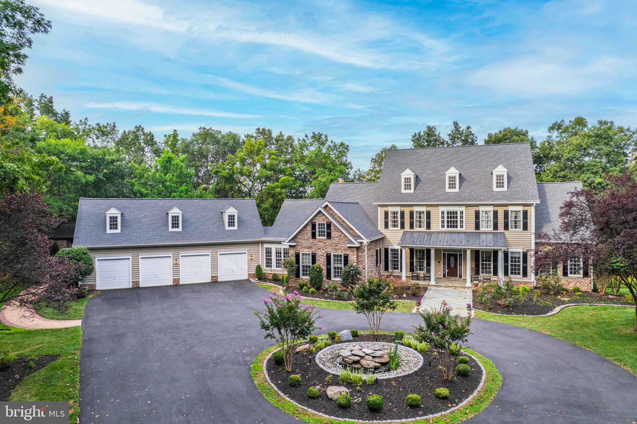 Executive Luxury Estate on 10 Private Acres
Welcome to your own private sanctuary — a gated executive retreat nestled on 10 acres of pristine landscape, complete with a circular hardscaped driveway and breathtaking curb appeal. This custom-built masterpiece features a 4-car garage, professional landscaping, and exceptional craftsmanship throughout,brand-new roof (2025)
Inside, the main level primary suite offers a spa-like escape with a Jacuzzi tub, walk-in shower, dual closets, linen storage, a dressing room, and French doors that open to your private deck with tranquil wooded views.2ndbd or Office/study
The grand foyer opens to soaring cathedral ceilings in the family room, highlighted by a stacked-stone wood-burning fireplace. The open gourmet kitchen is a chef’s dream, boasting two islands, butler’s pantry, walk-in pantry with a second refrigerator, two sinks, gas range, wall oven, built-in microwaves, and elegant finishes. A breakfast sunroom and screened patio invite relaxed living, while the vast wrap-around deck provides unmatched views — including winter mountain vistas.
Enjoy serene outdoor living with a koi pond, stone stairways to Catharpin Creek, private nature trails, and abundant wildlife sightings. Entertain in style with an outdoor stacked-stone pizza kitchen, wood-burning oven, fireplace, covered pergola, and charming water features.
Upstairs offers a loft, 3 bedrooms with a Jack-and-Jill bath, plus a separate guest suite with a private full bath. The finished basement is a true entertainment haven — complete with a billiard room, gaming area, half bath, full brass rail bar with wine refrigerator and dishwasher, guest bedroom with full bath, stacked-stone and gas fireplaces, built-in surround sound, and walk-out access to the grounds. Over 1,900 sq ft of unfinished storage provides endless potential. This is more than a home — it’s a private luxury lifestyle, just minutes from modern (Haymarket conveniences, Old`town, Giant, Schools, Commuter lot, National Battlefields, John long Park. The riding club, Golfing!  Yet this stunning retreat is worlds away from the everyday.