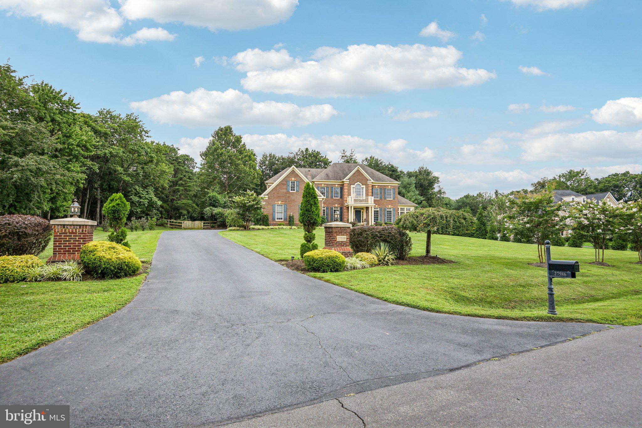 Entertainer’s Delight on Over 3 Private Acres – A True Luxury Retreat

Welcome to your personal oasis—this extraordinary residence is nestled on over 3 acres of beautifully landscaped, tree-lined privacy, offering a rare blend of luxury and serenity. The setting is peaceful and secluded, yet perfectly designed for entertaining and everyday comfort.

Outdoors, you’ll find a true entertainer’s dream featuring extensive hardscaping, elegant exterior lighting, multiple patios, a spacious deck, and a balcony overlooking the lush surroundings. The custom covered BBQ grill and bar area is ideal for gatherings, all set within the tranquility of your own private, wooded retreat. Relax under the pergola as the sun sets.

Inside, no detail has been overlooked. From the moment you enter, you're greeted by curved staircases, rich wood floors, and timeless architectural touches like crown molding and chair rails. The expansive gourmet kitchen boasts a massive island, huge walk-in pantry, and opens to a sun-filled breakfast room and family room with multiple seating areas. A formal dining room with a butler’s pantry sets the stage for memorable dinner parties, while a bright sunroom offers a peaceful retreat.

Upstairs, enjoy oversized closets and generously sized rooms, providing both luxury and functionality. Sip your morning coffee on the private balcony off the renovated Owner's Suite which also features a Butler's Pantry and Private Sitting Room.  The lower level is custom-designed for entertaining with a full bar,  plenty of open space for hosting or relaxing and a home theater for movie night.

Whether you're entertaining guests or enjoying quiet moments in nature, this home delivers on every level—comfort, style, and the peace of a quiet, private estate.

Hot water heater and (2) HVAC is 2021, sunroom  unit 2025, roof 2018.  VA Assumable Loan.
