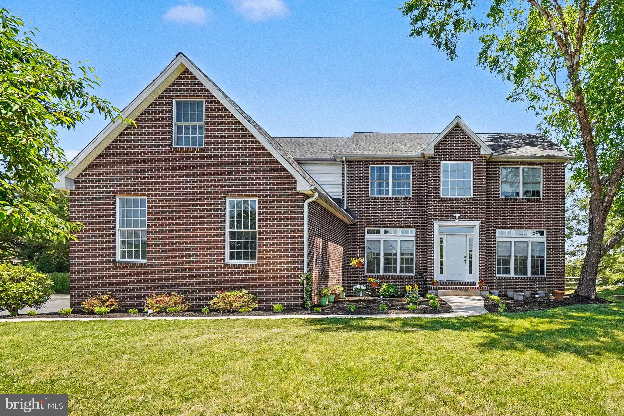 Loads of curb appeal! Situated on 1.2 acres on a quiet cul de sac, 4-bedroom, 3 full bath colonial offering 3,340 sq. ft. of living space and located in the sought-after community of Woodholme II in the Elk Neck area with close proximity to Rt 40, I-95 and Harford County. As you enter you will be greeted with a sprawling foyer featuring a cathedral ceiling and gorgeous hardwood flooring. Hardwoods continue in the living room, formal dining and lofty great room with features that include a cathedral ceiling, second story overlook and cozy propane burning fireplace. Adjacent to the great room is a recently updated eat-in kitchen with details that include an island with seating, sleek quartz countertops, stainless steel appliances, 6' X 5' pantry, attractive LVP flooring, 42" cabinetry, striking backsplash and a breakfast area with sliders leading to a paver patio and fenced-in rear yard. Ideal for outdoor living and entertaining! Additional main level details include a home office/den, full bath and laundry room with storage and convenient garage access. Upper-level highlights include beautiful bamboo flooring throughout, a loft area, 4 bedrooms (all with vaulted ceilings), including a primary with a MASSIVE walk-in closet, attached bath, as well as an additional full bath. Lower-level details include 5 partially finished rooms (dry wall added), which could be utilized as a recreation room, hobby area, exercise room or media room. Exterior details include a 3-car side entry garage, landscaping and a rear fenced-in yard. Perfect for gardening and children and pets to safely run and play. Upgrades include a complete modern kitchen renovation (2020), a new architectural shingled roof added in 2026 and a newer driveway. HOA fees are $500.00 yearly and include common area maintenance. If you are searching for a spacious, nicely maintained home located in a peaceful and friendly community, your search is over...64 Open Meadow Court...A PERFECT place to call HOME!!!