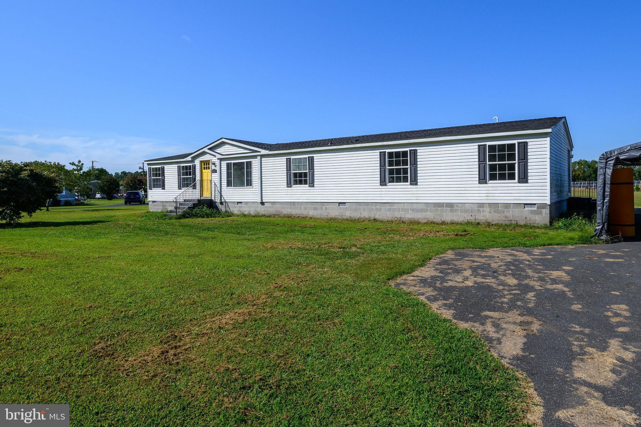 Spacious home on 1.22 acres has 4 bedrooms and 2 full baths, living room and dining room.  The primary bedroom is separated by the kitchen and living room giving you plenty of privacy. This property is only 8.3 miles to Coastal Hwy, Lewes, Delaware where you'll enjoy all the benefits of downtown, including Cape Henlopen State Park, dining and great entertainment. Enjoy the private back yard. No HOA! 
 
New energy efficient HVAC was installed last year. New flooring. Schedule your appointment today.