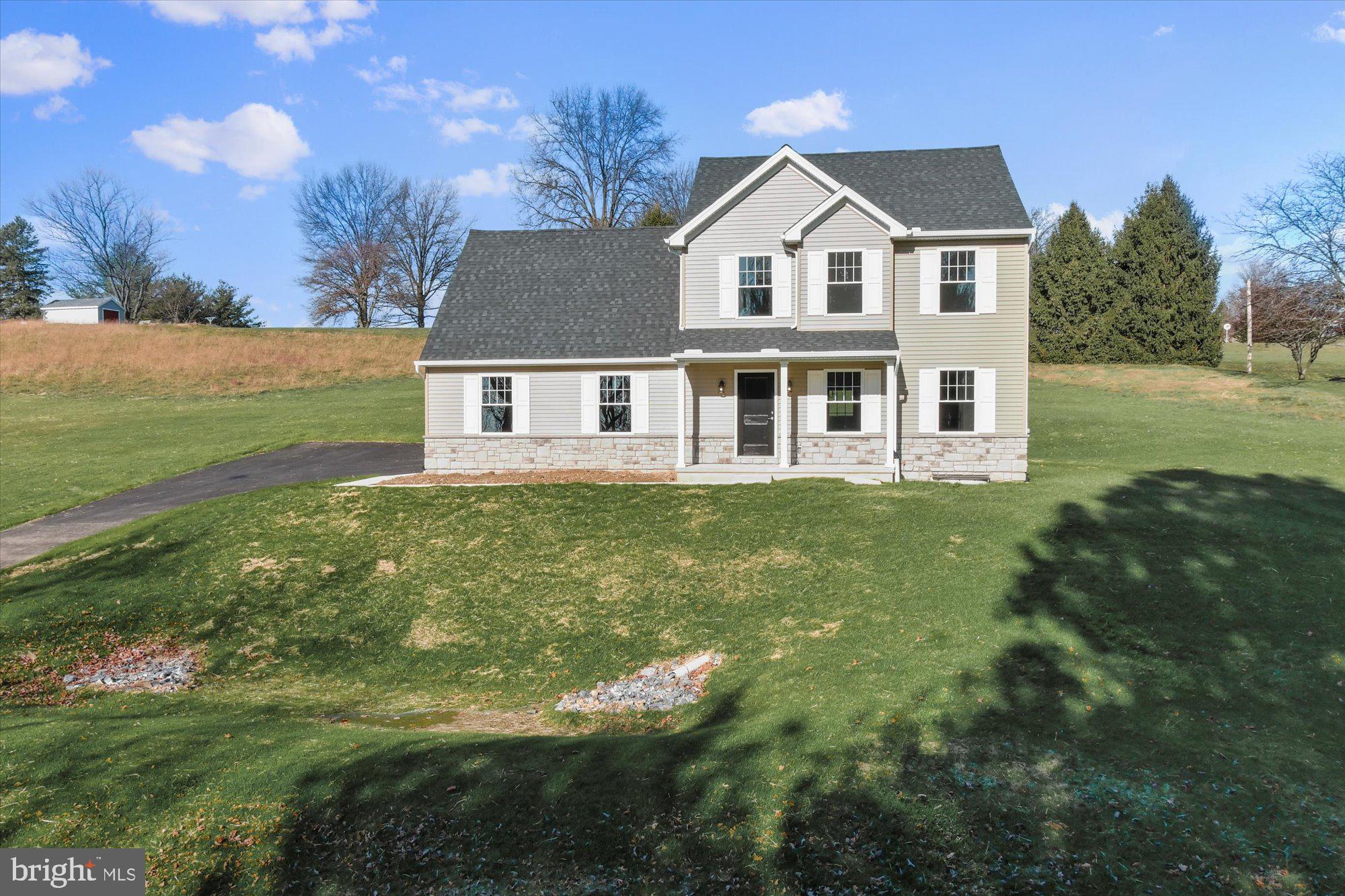 Wow! Priced to sell new construction on a 1.68 acre lot and quick possesion! Come soak in the beautiful views that this private lot has to offer. This home includes 4 bedrooms, 2 and a half bathrooms and an efficient floor plan. Full basement and a 2 car garage allows for plenty of storage space! Call us today to see why new construction is your best option!