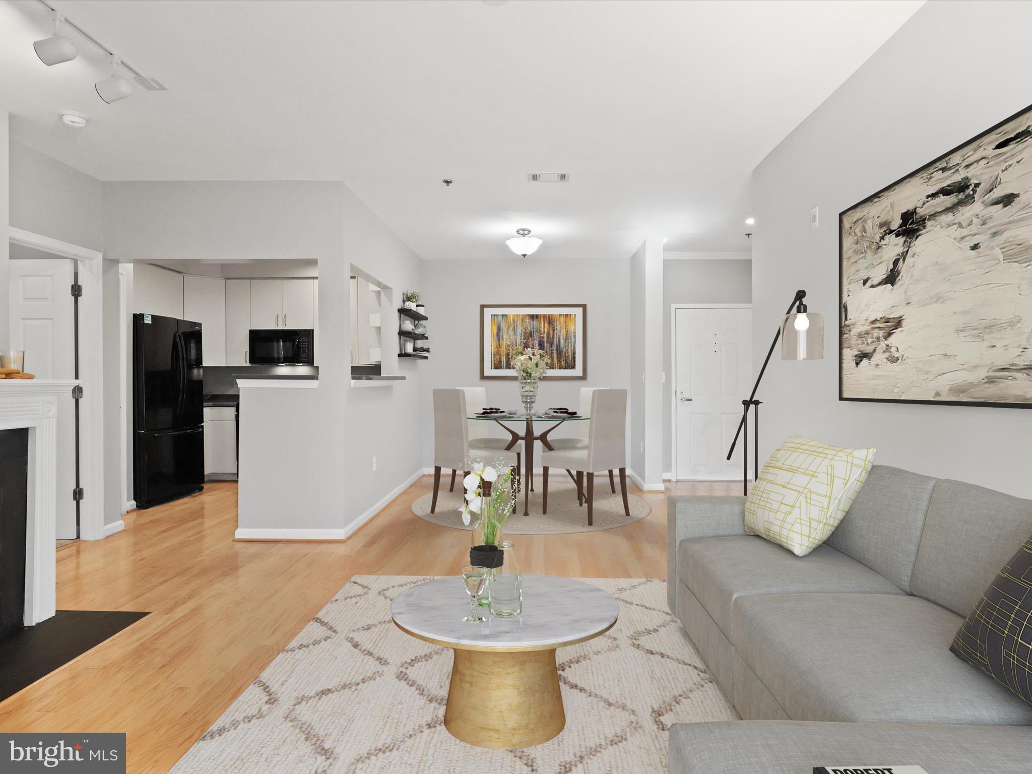 Location location location! Be at the center of it all in this Stratford Park condo, in the heart of Reston's downtown district. With Reston Town Center right across the street, you can enjoy RTC living without the RTC price tag! Walk to everything - Metro, shopping, dining - every major convenience is at your fingertips! The condo is located in a secure, garden-style building with an elevator. Inside the unit you will find a desirable 2-bed/2-bath layout, separated by the living/dining area. The unit is fully move-in ready with fresh paint, new carpet and new light fixtures. HVAC replaced in 2016. Enjoy the balcony overlooking a peaceful courtyard. Unit comes with a reserved garage parking space and storage unit. Community amenities include a pool, clubhouse and gym. Don't miss this opportunity to be in your new home for the holidays!