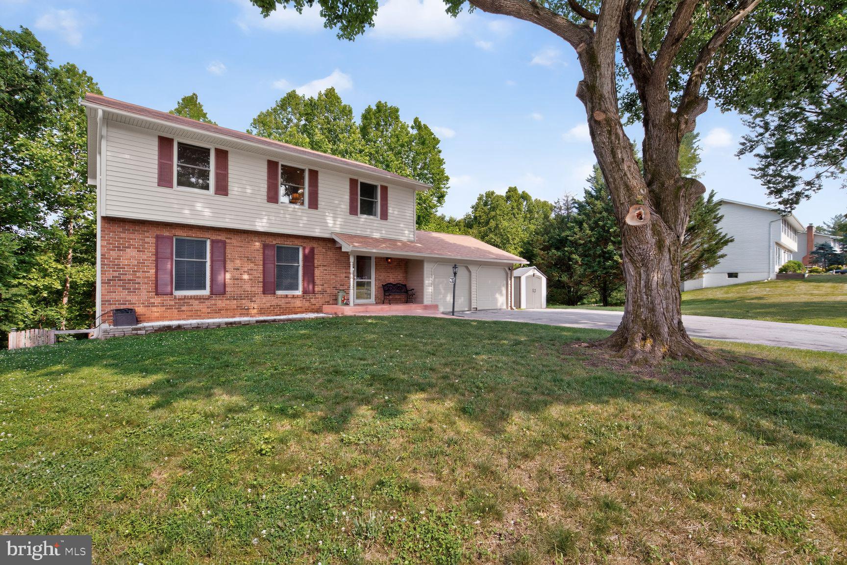 Welcome to 4678 Stallion Court, a beautifully maintained 4-bedroom Colonial tucked away on a peaceful cul-de-sac in the highly desirable Meadowbrook community of Ellicott City. Situated on approximately ½ acre, this exceptional home backs to serene parkland and wooded open space, offering privacy and picturesque views year-round. Designed for both comfortable everyday living and effortless entertaining, the home features generous room sizes, a spacious first-floor family room, and a stunning screened in porch that fills with natural light while showcasing the tranquil backyard setting. The heart of the home is the renovated kitchen, complete with granite counter tops, stainless steel appliances, abundant cabinetry, and updated flooring. Gather around the cozy nook in the kitchen featuring a beautiful fireplace insert—perfect for relaxing on cool evenings. The finished walkout lower level provides a large recreation room, excellent storage space, and direct access to the expansive backyard with a large fenced in area. Thoughtfully updated by the current owners, this home offers peace of mind with numerous improvements including: new flooring, replacement roof, replacement siding, stamped concrete walkway and more. The large backyard provides plenty of room for outdoor entertaining, gardening, or simply enjoying the peaceful natural surroundings. Located just minutes from shopping, dining, parks, commuter routes, and all that Ellicott City has to offer, this move-in ready home combines timeless charm with modern updates in an exceptional location. Don't miss this rare opportunity to own a beautifully updated colonial on one of Meadowbrook's most desirable cul-de-sac lots.