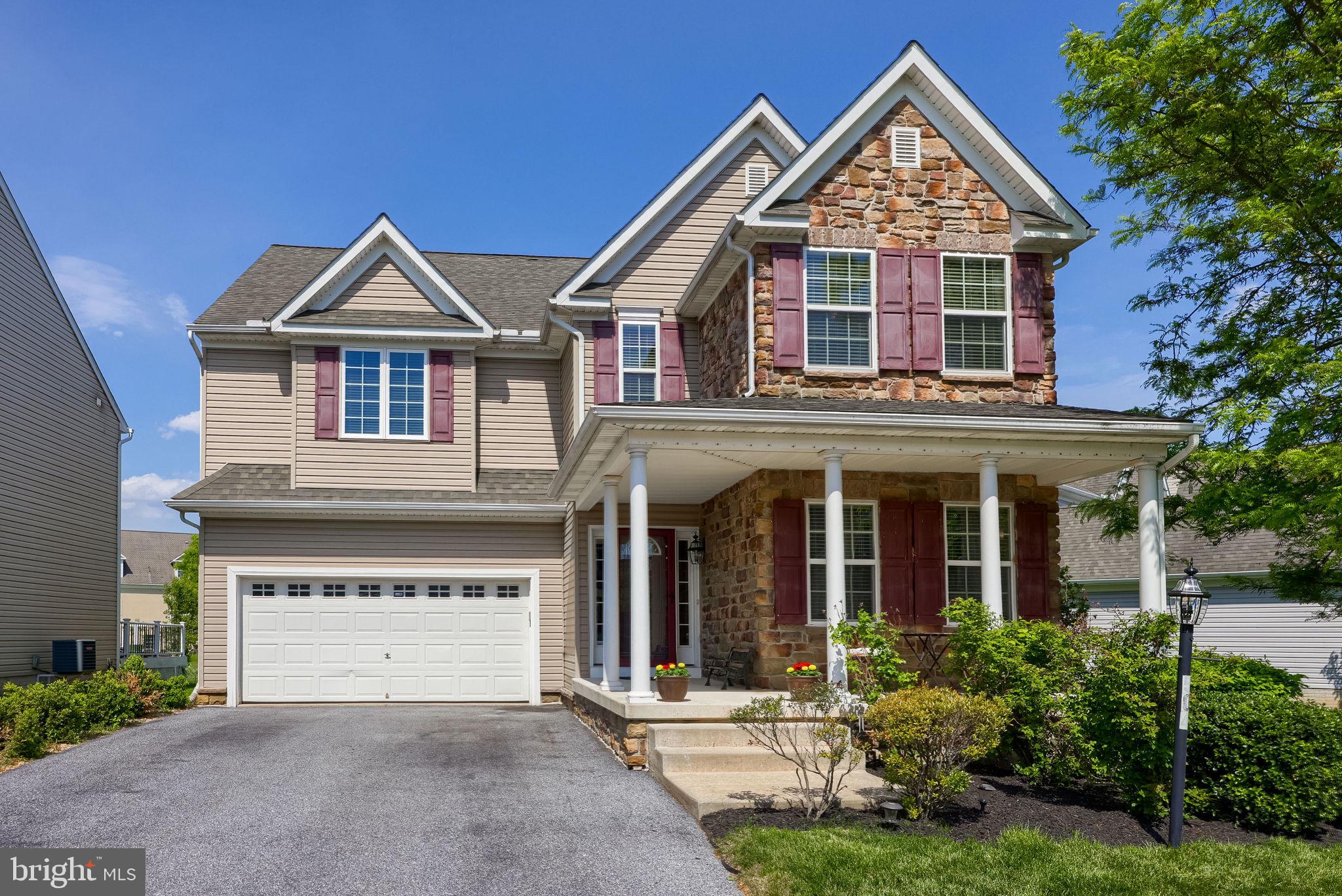 Welcome to this beautifully maintained two-story home in the heart of Worthington, where convenience and comfort meet. Its prime location offers easy access to major highways, excellent schools, healthcare, shopping, and restaurants.

Step inside to find an open and airy main level with 9-foot ceilings and gleaming hardwood floors. A spacious front office provides a perfect work-from-home setup. Flowing from the foyer, the formal dining room leads through the pantry into the bright and functional kitchen. Here you'll find ample Corian countertops, a large central island, stainless steel appliances, and abundant cabinet storage. The adjoining sunny breakfast nook opens to a rear deck and private yard, backing to open space and direct access to community walking trails. The cozy family room, with its warm gas fireplace, completes this inviting living space.

Upstairs, the hardwood floors continue into four well-proportioned bedrooms. The generous primary suite features dual walk-in closets and a private bath with a tiled shower, separate soaking tub, and double-sink vanity. The three additional bedrooms share a stylish full bathroom with dual vanity and tiled shower. A convenient second-floor laundry room adds everyday ease.

The fully finished lower level expands your living space with a large recreation room, a full wet bar, and an additional full bathroom—ideal for entertaining, guests, or relaxing.

Move right into this spacious, ready-to-enjoy home in one of Manheim Township’s most convenient neighborhoods.