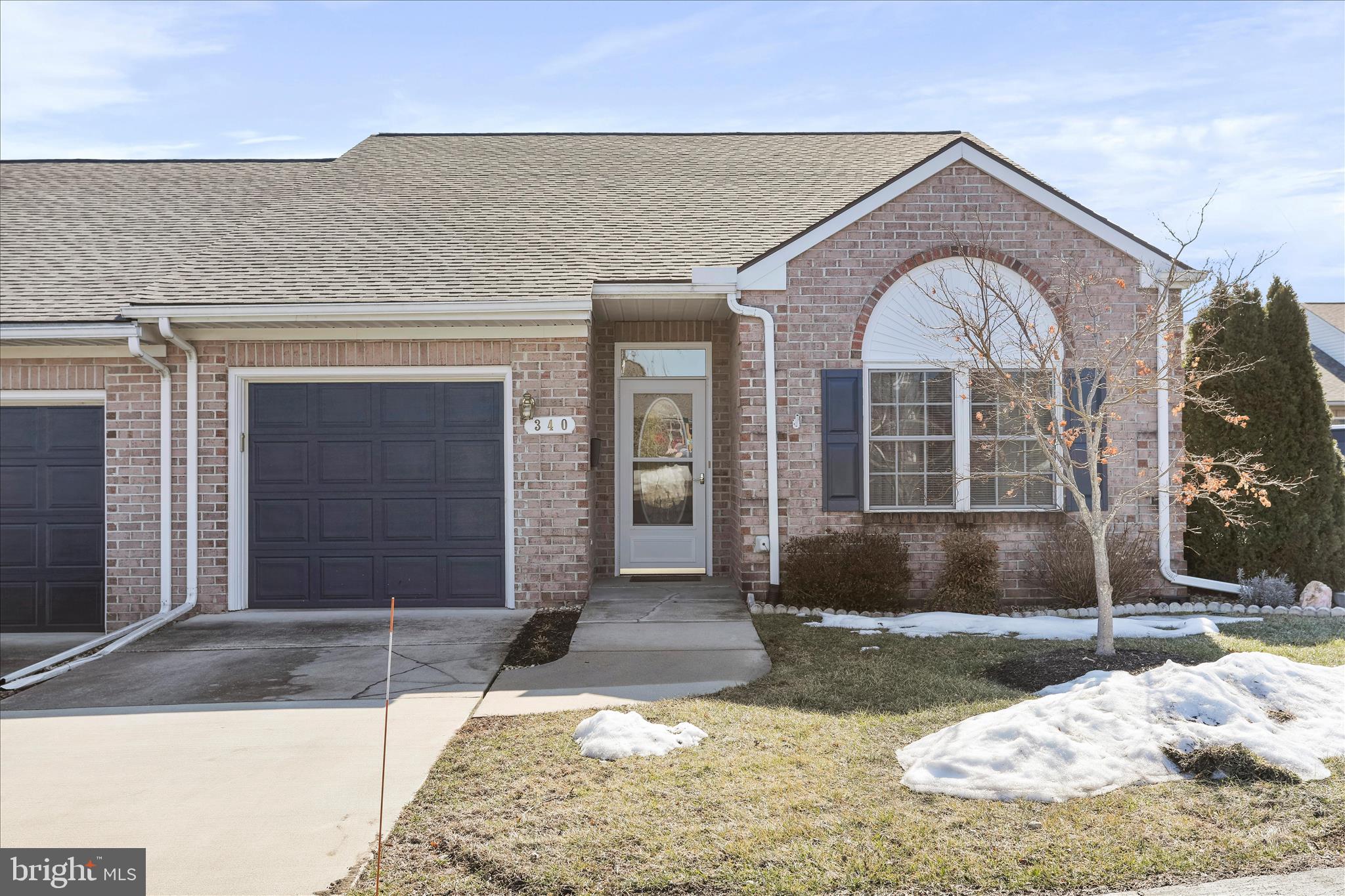 Welcome to our newest listing here at Summerland Manor! This end-unit home offers 1-level living, with 2 bedrooms and 2 full baths. This "Hemingway" model has 9' ceilings, and a lovely sunroom for your enjoyment. Hardwood flooring, as well as newer beautiful luxury vinyl in the foyer, living room, and kitchen.and second bedroom.  This nice and bright, fully-equipped kitchen offers upgraded quartz countertops with a pretty backsplash too! Newer roof within the last few years, and new blown-in insulation with R-50 value for an added energy saving feature. If you're looking to get away from exterior maintenance, this gated community may be the place for you. Don't wait to schedule your showing and contact us today!