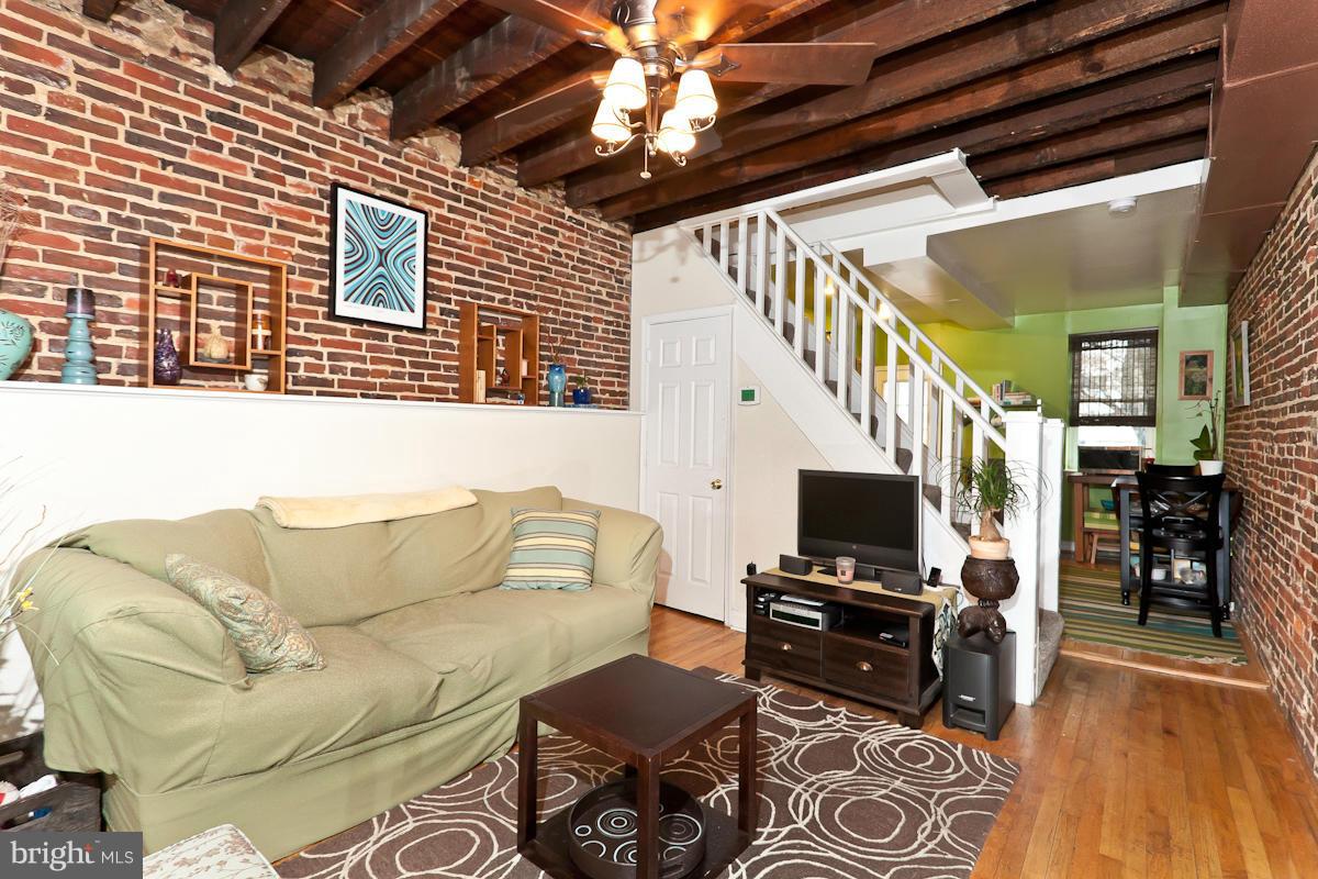 HISTORICALLY RECOGNIZED, THIS EOG IS STORY BOOK CHARMING! TUCKED AWAY ON A QUIET STREET IN THE HEART OF FED HILL, THIS HOME IS OPEN & BRIGHT W/ 2BR & 1 BA, GREAT CLOSETS, WOOD FLRS, EXP BRICK , ORIG BEAMED CEILINGS, TERRIFIC KIT W/ CUSTOM PAINTED CABINETS, HUGE BASEMENT FOR STORAGE, FANTASTIC REAR YARD THAT COULD BE POSS PARKING PAD. SELLER WILL ALSO PAY FOR ONE YEAR OF PARKING IN ADJACENT LOT.