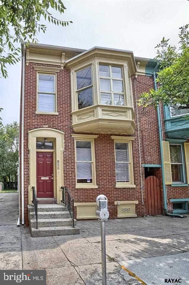Walk to downtown York!  Move in Ready Brick Semi.  This 4 Bedroom home has plenty of room! EIK with new vinyl flooring, large Living room and Dining room- Dual staircases Off street parking for 3+ cars, fenced in yard, spacious second story deck. Come see this super value home today!