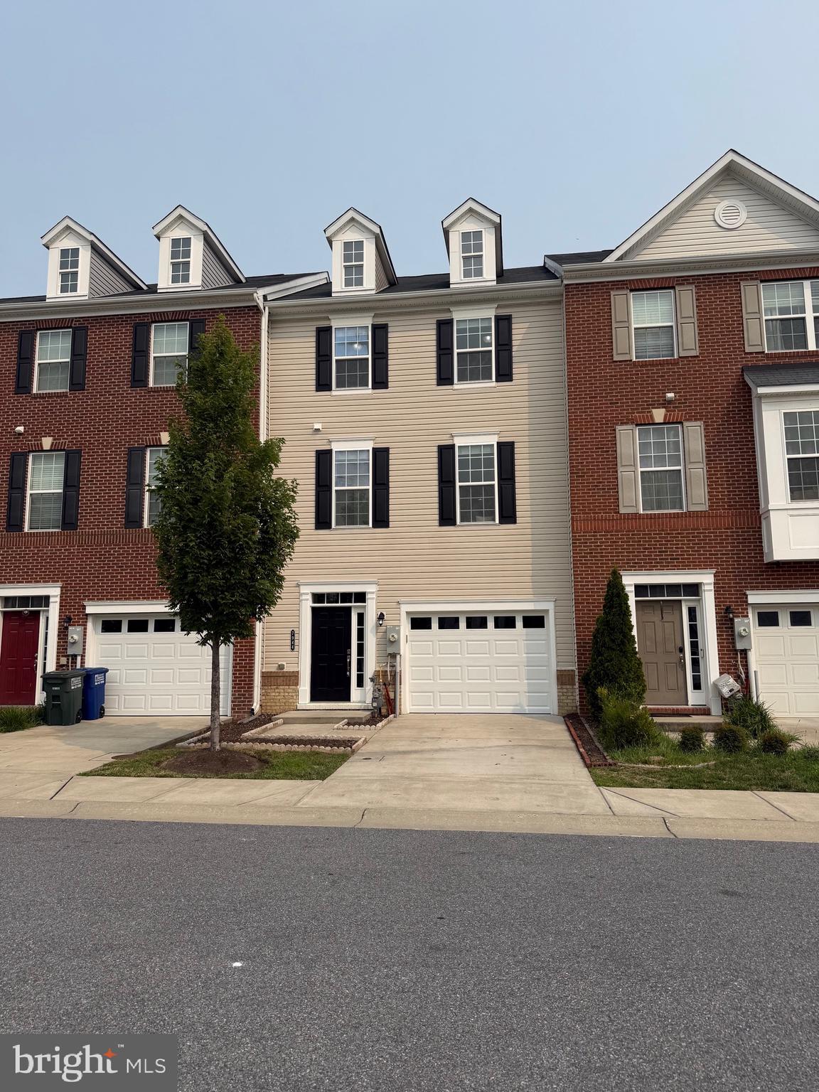 Showings start today! Open Sunday 1:30PM-3:30PM! Professional photography + floor plans on the way! Gorgeous 4 Bed/3.5 Bath Morris Place exclusive is finally here and ready to impress! 2,400 sqft freshly painted inside and out with 2026: carpet + padding, garage door, and pressure washed deck! Party starts on the Main featuring the perfect Guest Suite + multiple closets with access to deep 1-car front load garage + epoxy floors! Upstairs is the sunlit Kitchen/Dining/Living trio featuring granite countertops, cabinets galore, new built-in microwave + gas stove, organized pantry, plus deck and Powder for easy entertaining! Rest and recharge on the third in the Primary with spacious walk-in closet, bonus closet, and 4-piece bath! Bedrooms #2 and #3 are down the hall with shared full bath + stacked Laundry! Get pumped for plenty of guest parking on the driveway and unassigned street/lot! Enjoy the community sidewalks/event field/gazebo/picnic area/Dog Park! Look forward to even more outdoor activities at Troy Park, Rockburn Branch Park, Lake Elkhorn, Blandair Regional Park, Merriweather Post Pavilion, Merriweather District, and Columbia Lakefront! Get your shopping on at nearby Costco, Trader Joe's, ALDI, Walmart, Target, Giant, Starbucks, MOM's Organic Market, Home Depot, Lowe's, Wegman's, Whole Foods, Arundel Mills, and Mall in Columbia! Close to I-95, 1-295, Route 100, Route 175, Route 32, and Route 29! Low monthly HOA of $124.12 covers common area maintenance/lawn mowing/snow removal/trash/recycling! Howard County Public Schools! See you soon!
