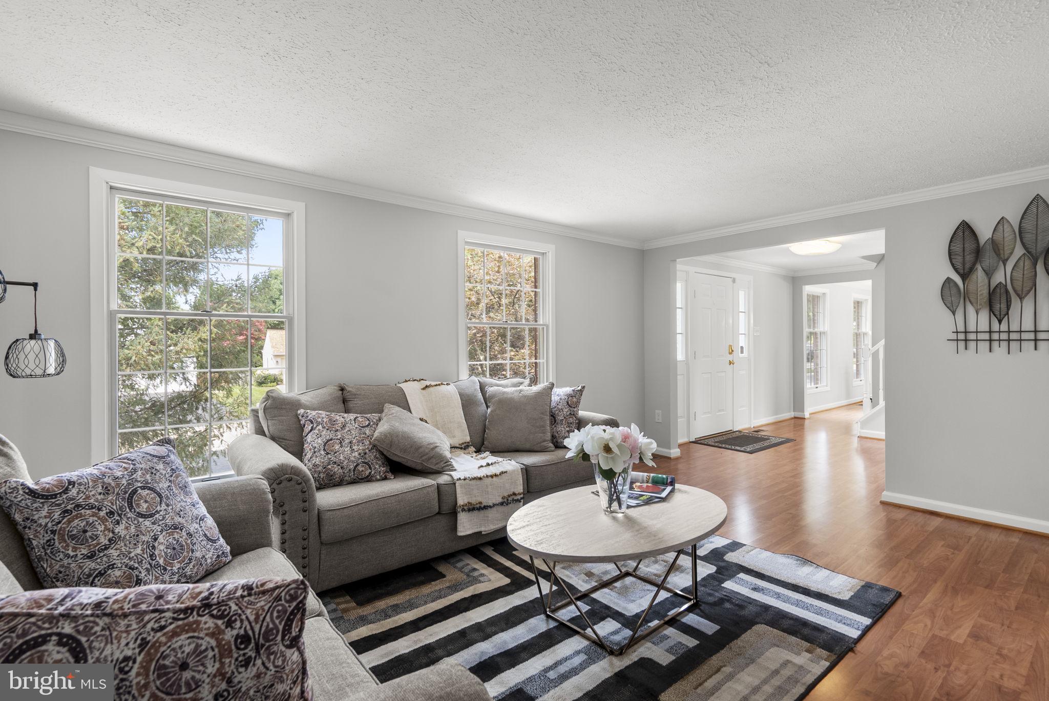 Beautifully updated and move-in ready, this spacious 5-bedroom, 2.5-bath single-family home with an attached two-car garage offers the perfect blend of comfort, style, and functionality. The main level features a bright and inviting floor plan highlighted by a fully renovated kitchen with modern cabinetry, updated countertops, and brand-new stainless-steel appliances, including a refrigerator, stove, dishwasher, and built-in microwave. The hall bathroom and primary en-suite bathroom have been tastefully remodeled with contemporary finishes. The finished lower-level features new flooring and provides versatile space for a recreation room, home office, gym, or playroom. Major improvements include a newer roof (2018), replacement main-level windows (2014), and a new water heater, providing peace of mind for years to come. Step outside to a large rear deck overlooking the spacious backyard—an ideal setting for outdoor dining, entertaining, or simply relaxing. Conveniently located near parks, shopping, restaurants, schools, I-270, the MARC Train, and other commuter routes, this exceptional home combines modern updates, generous living space, and an excellent Germantown location.