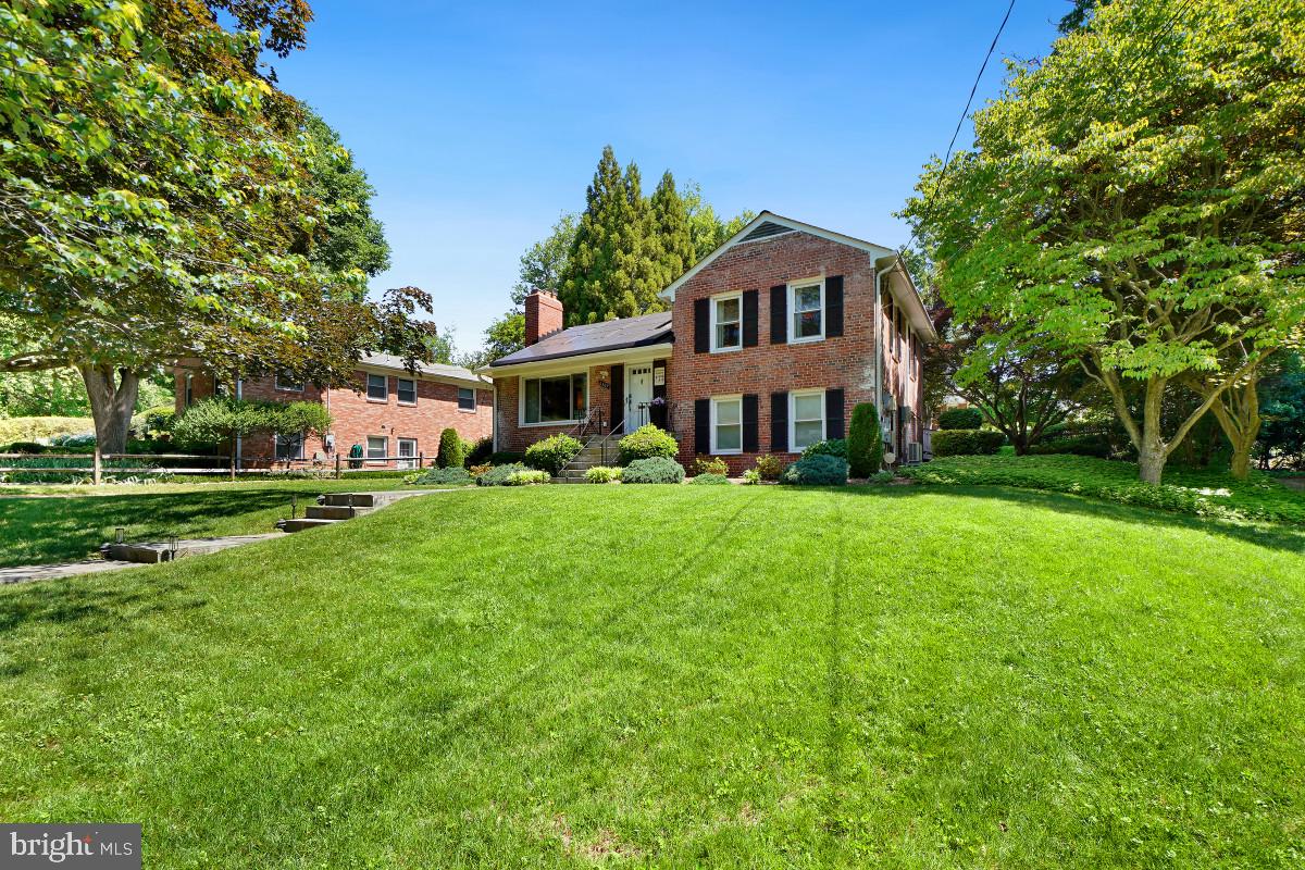 Welcome to 6307 Blackwood Rd. in desirable Bethesda! Nestled on a lush 0.22-acre cul-de-sac lot, this charming brick-front single-family home offers an exceptional location just off River Road with easy access to DC, Virginia, local shopping, dining, and transit options.

Boasting over 2,100 square feet of living space, this well-maintained home features 3 bedrooms and 2 full bathrooms across multiple spacious levels. The welcoming main level showcases gleaming wood flooring, a bright living room with a cozy wood-burning fireplace, and a formal dining room perfect for entertaining. The adjacent eat-in kitchen offers extensive custom cabinetry, a built-in peninsula for casual dining, wall-to-wall pantry storage, a 5-burner gas range, and a skylight that fills the space with natural light.

Just off the kitchen, the expansive family room impresses with vaulted ceilings and dramatic wall-to-wall windows overlooking the beautifully landscaped backyard. Step outside to the oversized rear deck with stairs leading down to the fully fenced yard that is ideal for outdoor entertaining, gardening, or relaxing in a private setting.

The upper level is dedicated to the spacious primary suite, featuring a large sitting area, double closets, and a private full bath with timeless tilework details and a tub/shower combination. The lower level includes two generously sized bedrooms and an additional full bath, offering flexibility for guest rooms, home offices, or den space. The basement level includes a large rec room with a second wood-burning fireplace, along with access to the laundry and utility room.

A wonderful opportunity to own a spacious home in one of Bethesda’s most convenient and sought-after locations!