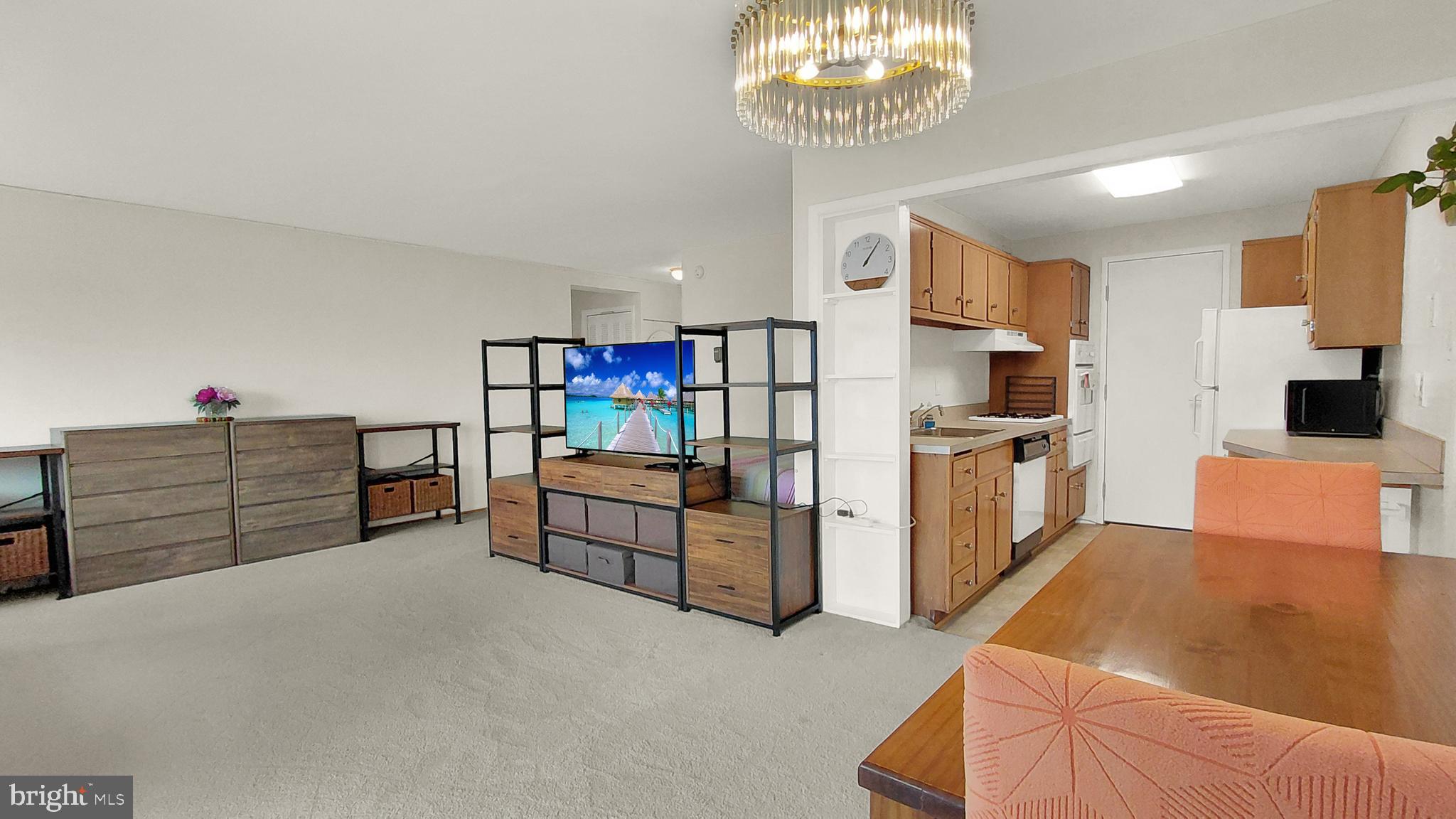 This unit has it all:   FURNISHED and move-in ready with BALCONY and DEEDED GARAGE SPACE.  14th Floor Park View toward morning sun.  Nearly 600 square feet of living space in Grosvenor Park - the jewel of Montgomery County.  Floor plan includes Galley Kitchen with service entrance and gas cooking, large living area, separate dining area with balcony access, plus coat, linen and large walk-in utility closets.  Close to Grosvenor Metro Station, Strathmore Arts Center, Walter Reed Medical Center, NIH, and all major shopping, restaurants and with routes to Bethesda, DC, VA, Frederick, Baltimore & Annapolis. Onsite award-winning Grosvenor Market, dry clean valet, hair dresser, party rooms, fitness center, community laundry, pool, picnic area, rooftop terrace, tot lot, bike and extra storage, 24/7 concierge and onsite security. Fios & Xfinity available in unit.  Free wifi in common areas.   Ample free parking outside for guests.   NO DOGS, but cats, birds and other small caged pets welcome!  SMOKE FREE.  Hallways newly renovated.